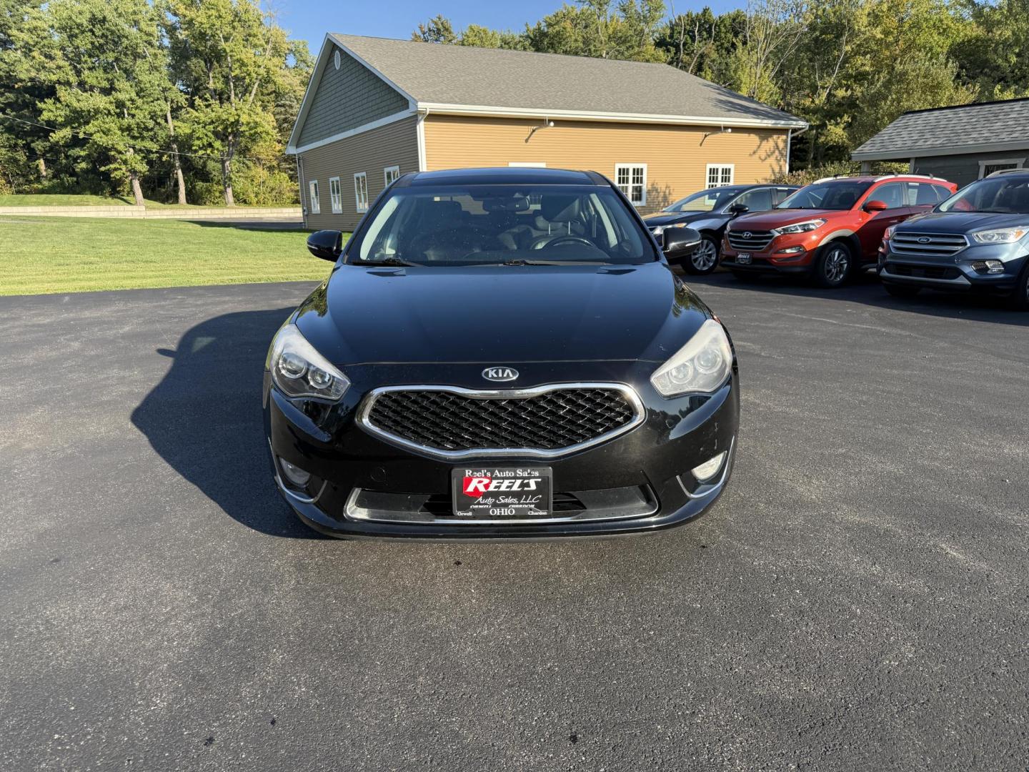 2015 Black /Black Kia Cadenza Premium (KNALN4D72F5) with an 3.3L V6 DOHC 24V engine, 6-Speed Automatic transmission, located at 11115 Chardon Rd. , Chardon, OH, 44024, (440) 214-9705, 41.580246, -81.241943 - This 2015 Kia Cadenza Premium offers a refined driving experience with its 3.3L V6 engine and 6-speed automatic transmission, achieving up to 28 MPG on the highway. Its upscale interior features Nappa leather, heated and cooled power front seats, heated rear seats, dual-zone automatic climate contro - Photo#1