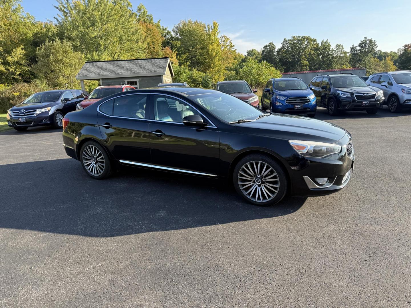 2015 Black /Black Kia Cadenza Premium (KNALN4D72F5) with an 3.3L V6 DOHC 24V engine, 6-Speed Automatic transmission, located at 11115 Chardon Rd. , Chardon, OH, 44024, (440) 214-9705, 41.580246, -81.241943 - This 2015 Kia Cadenza Premium offers a refined driving experience with its 3.3L V6 engine and 6-speed automatic transmission, achieving up to 28 MPG on the highway. Its upscale interior features Nappa leather, heated and cooled power front seats, heated rear seats, dual-zone automatic climate contro - Photo#3