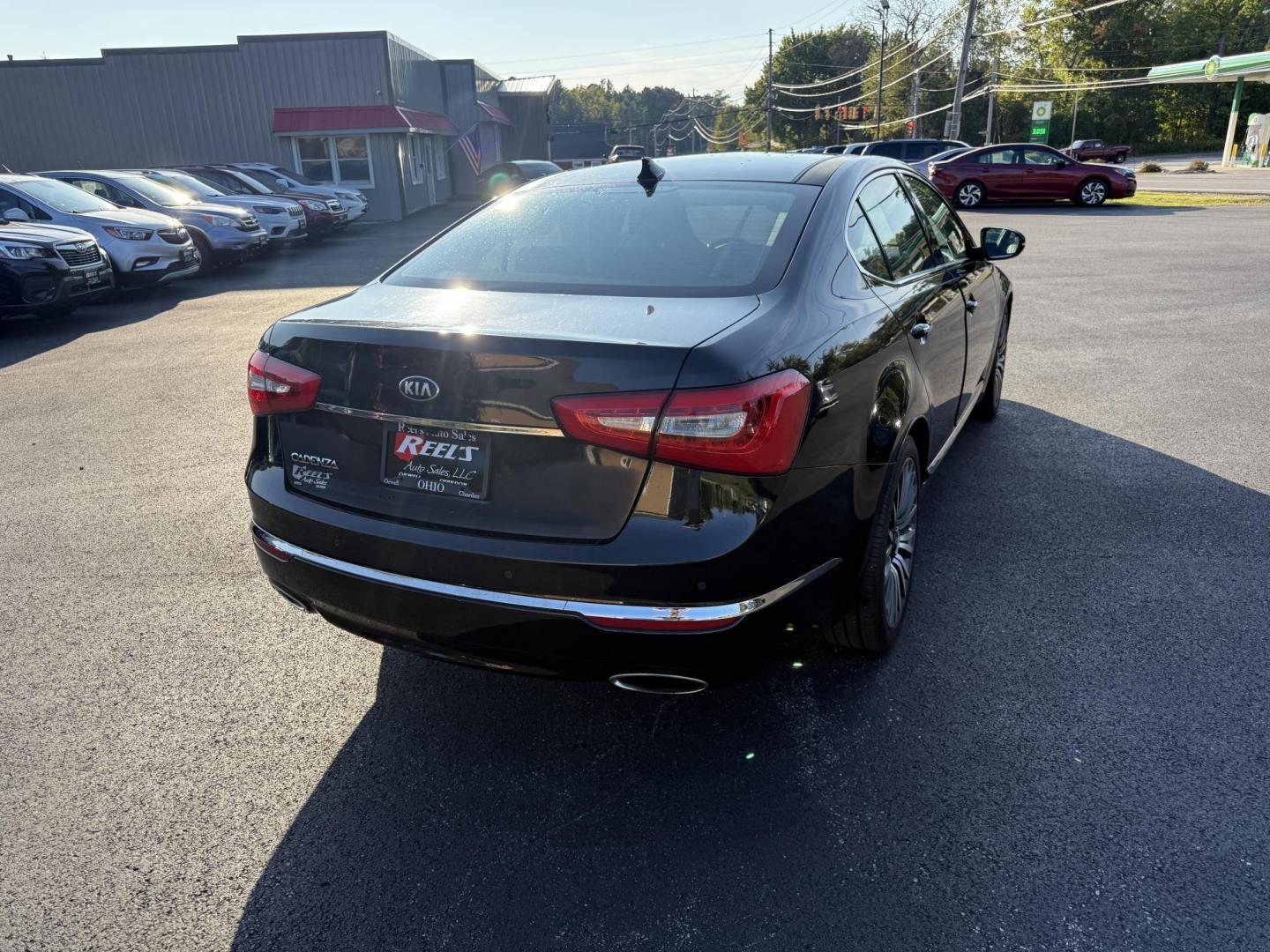 2015 Black /Black Kia Cadenza Premium (KNALN4D72F5) with an 3.3L V6 DOHC 24V engine, 6-Speed Automatic transmission, located at 11115 Chardon Rd. , Chardon, OH, 44024, (440) 214-9705, 41.580246, -81.241943 - This 2015 Kia Cadenza Premium offers a refined driving experience with its 3.3L V6 engine and 6-speed automatic transmission, achieving up to 28 MPG on the highway. Its upscale interior features Nappa leather, heated and cooled power front seats, heated rear seats, dual-zone automatic climate contro - Photo#7