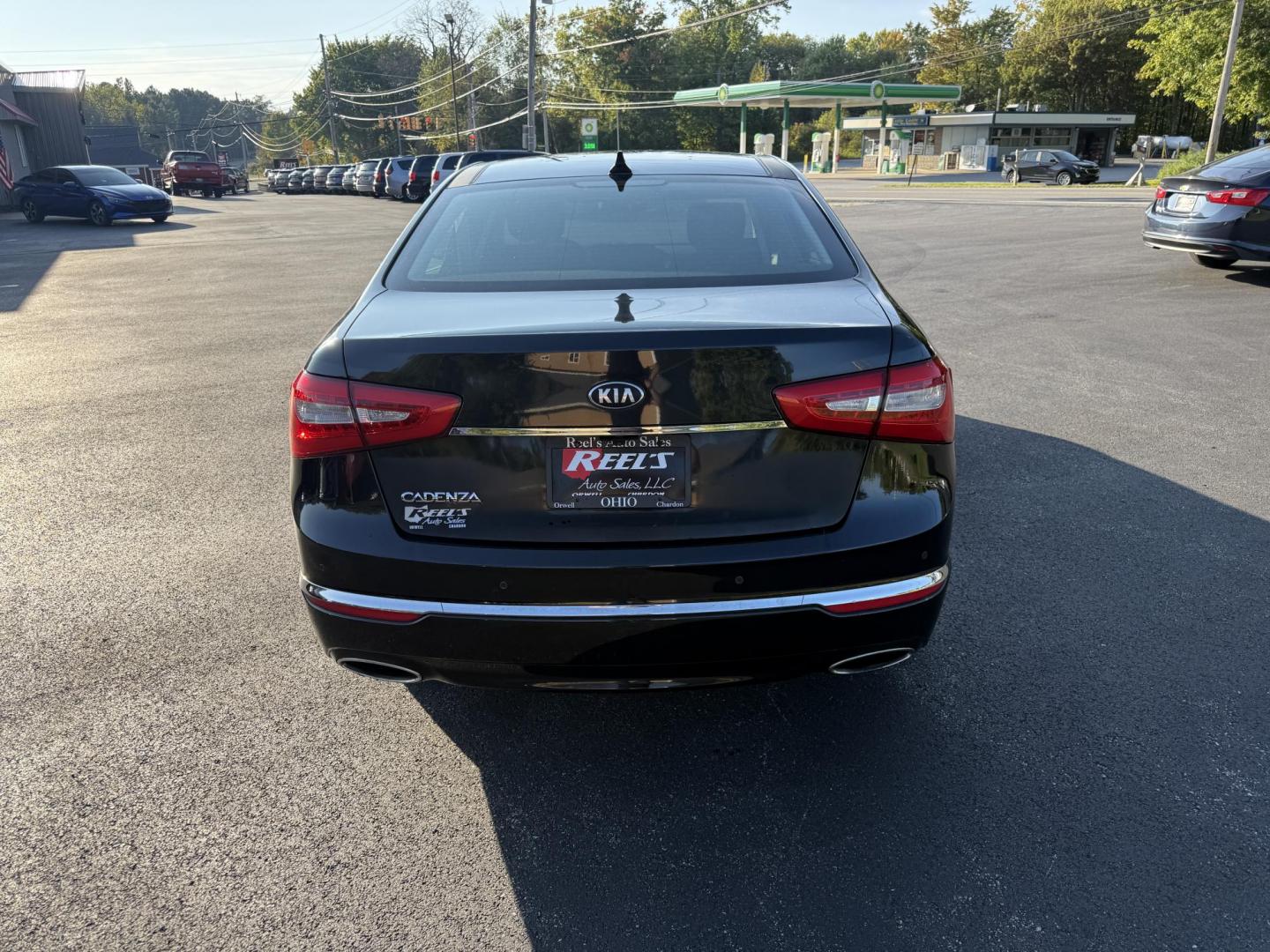 2015 Black /Black Kia Cadenza Premium (KNALN4D72F5) with an 3.3L V6 DOHC 24V engine, 6-Speed Automatic transmission, located at 11115 Chardon Rd. , Chardon, OH, 44024, (440) 214-9705, 41.580246, -81.241943 - This 2015 Kia Cadenza Premium offers a refined driving experience with its 3.3L V6 engine and 6-speed automatic transmission, achieving up to 28 MPG on the highway. Its upscale interior features Nappa leather, heated and cooled power front seats, heated rear seats, dual-zone automatic climate contro - Photo#8