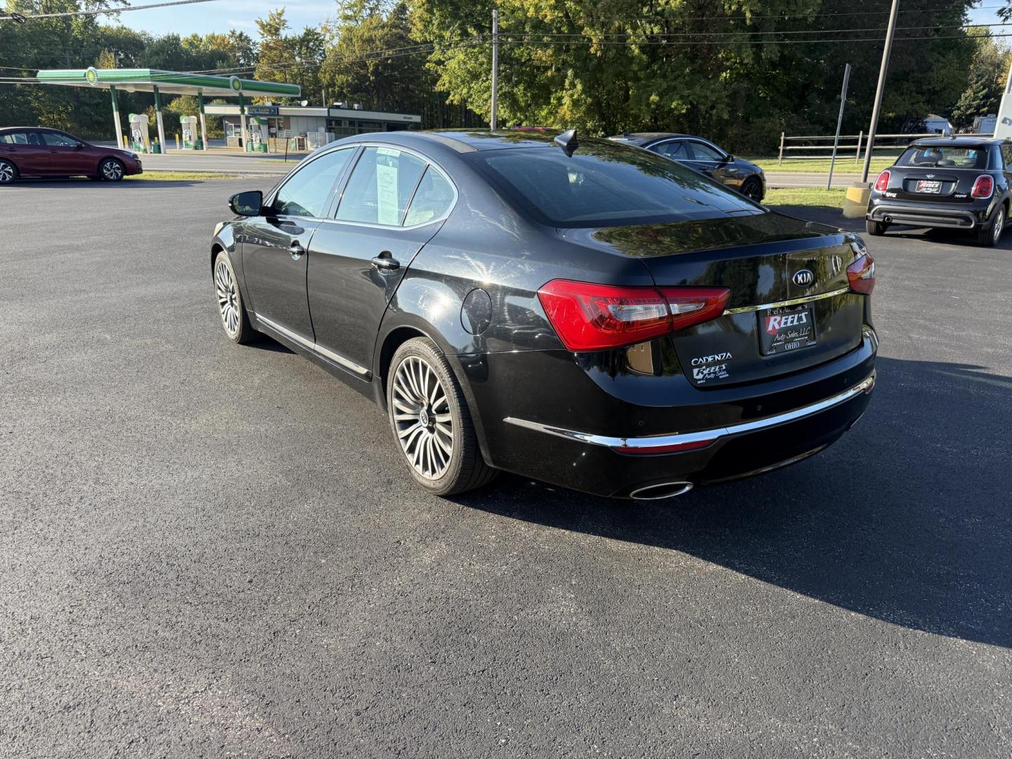 2015 Black /Black Kia Cadenza Premium (KNALN4D72F5) with an 3.3L V6 DOHC 24V engine, 6-Speed Automatic transmission, located at 11115 Chardon Rd. , Chardon, OH, 44024, (440) 214-9705, 41.580246, -81.241943 - This 2015 Kia Cadenza Premium offers a refined driving experience with its 3.3L V6 engine and 6-speed automatic transmission, achieving up to 28 MPG on the highway. Its upscale interior features Nappa leather, heated and cooled power front seats, heated rear seats, dual-zone automatic climate contro - Photo#9