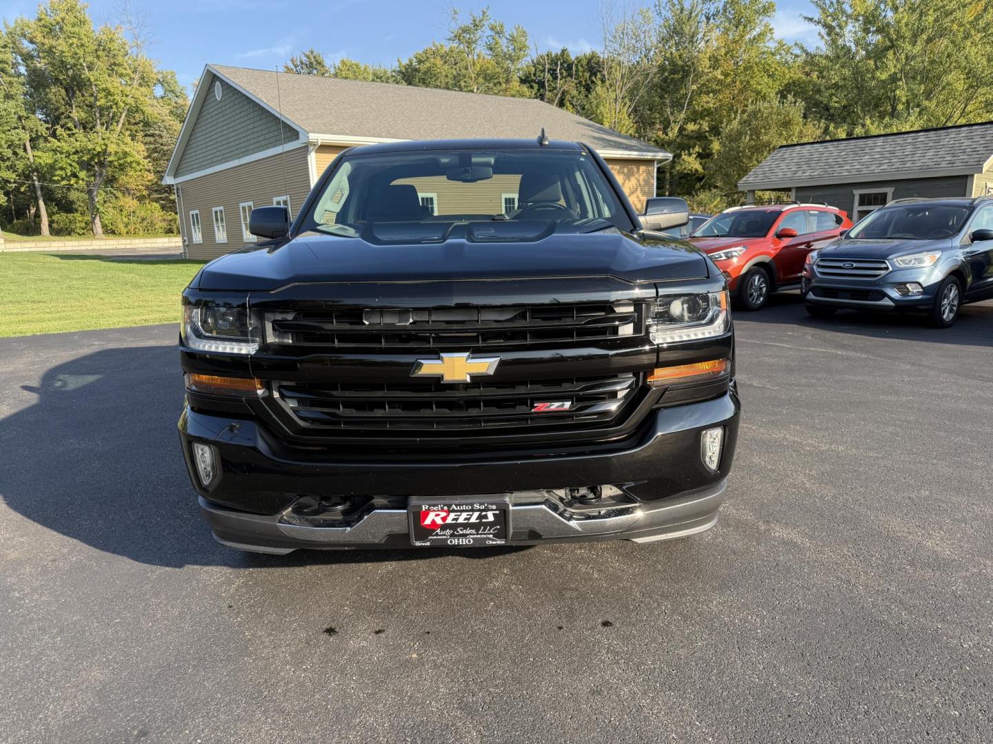 2017 Black /Black Chevrolet Silverado 1500 LT Double Cab 4WD (1GCVKREC2HZ) with an 5.3L V8 OHV 16V engine, 6A transmission, located at 11115 Chardon Rd. , Chardon, OH, 44024, (440) 214-9705, 41.580246, -81.241943 - This One Owner 2017 Chevrolet Silverado 1500 LT Z71 Double Cab is equipped with a 5.3L EcoTec3 V8 engine and a 6-speed automatic transmission, delivering strong performance and a 9,200-pound towing capacity. It features the Z71 Off-Road Package with a G80 locking rear differential and 3.42 gearing f - Photo#1