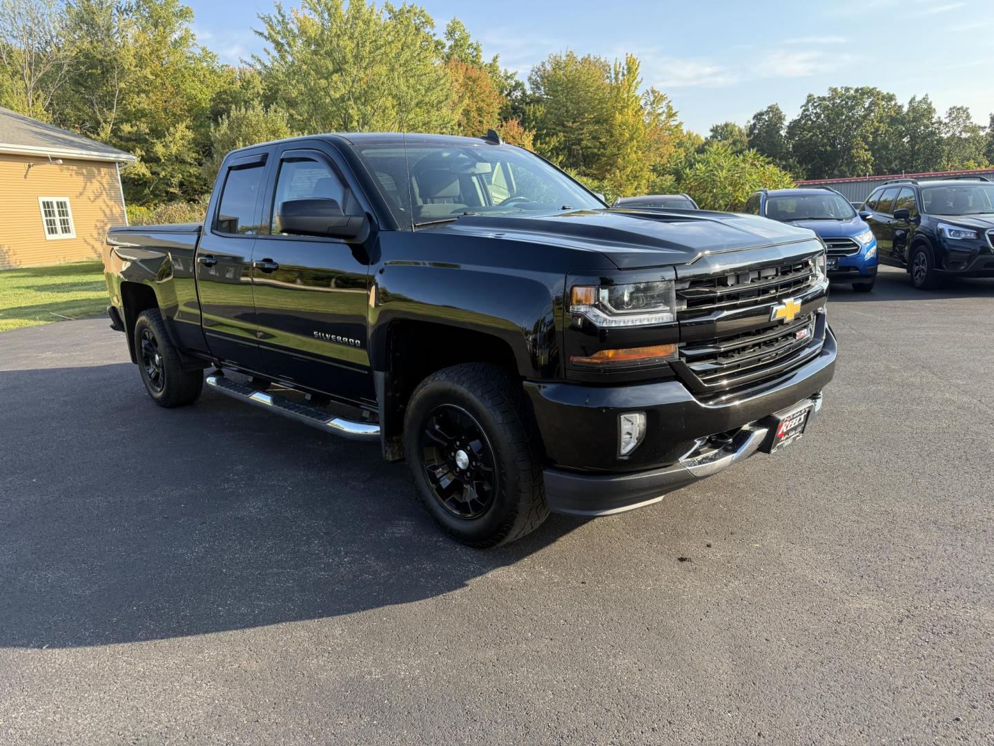 2017 Black /Black Chevrolet Silverado 1500 LT Double Cab 4WD (1GCVKREC2HZ) with an 5.3L V8 OHV 16V engine, 6A transmission, located at 11115 Chardon Rd. , Chardon, OH, 44024, (440) 214-9705, 41.580246, -81.241943 - This One Owner 2017 Chevrolet Silverado 1500 LT Z71 Double Cab is equipped with a 5.3L EcoTec3 V8 engine and a 6-speed automatic transmission, delivering strong performance and a 9,200-pound towing capacity. It features the Z71 Off-Road Package with a G80 locking rear differential and 3.42 gearing f - Photo#2
