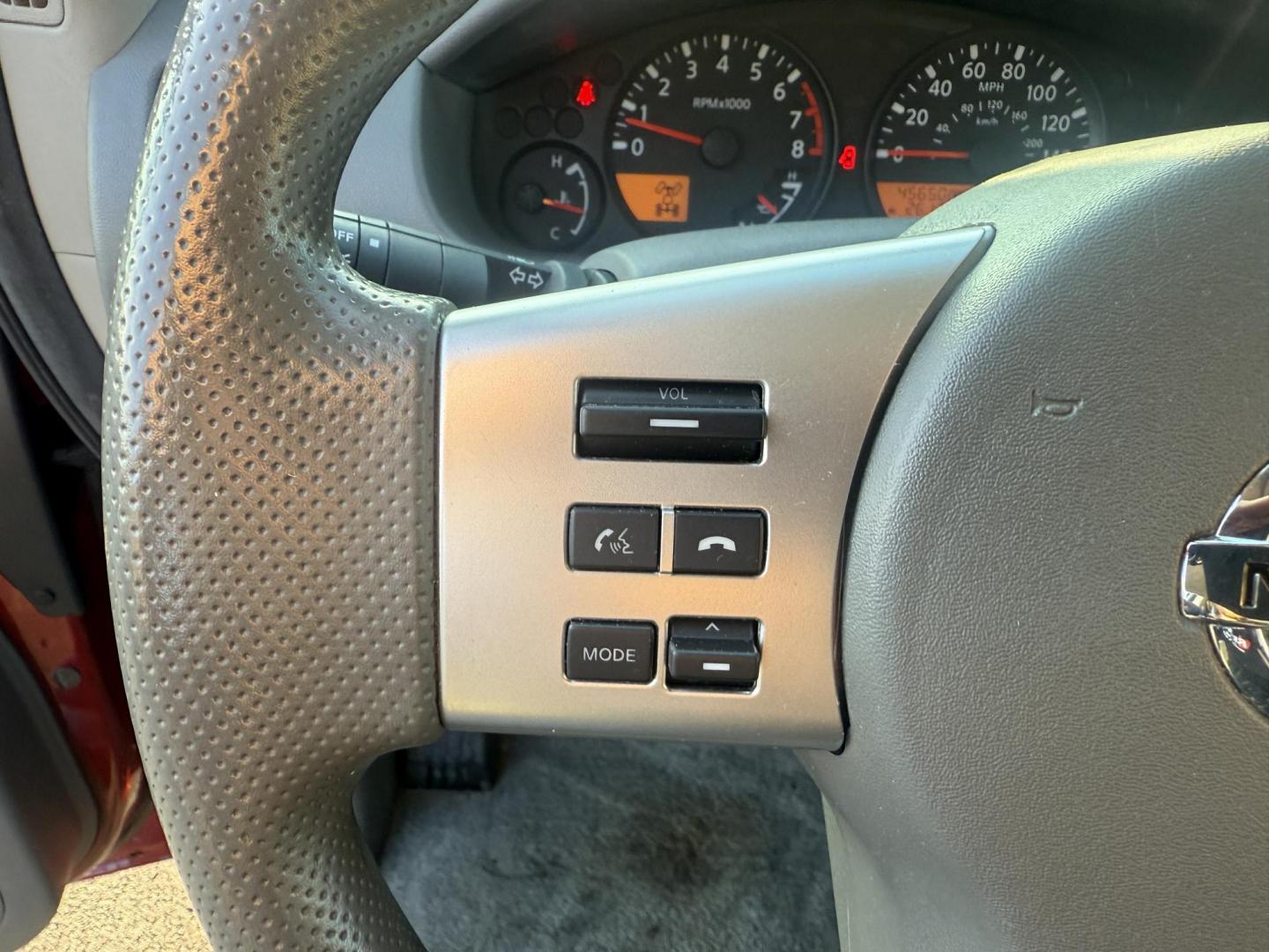 2015 Red /Gray Nissan Frontier S Crew Cab 5AT 4WD (1N6AD0EV7FN) with an 4.0L V6 DOHC 24V engine, 5-Speed Automatic transmission, located at 11115 Chardon Rd. , Chardon, OH, 44024, (440) 214-9705, 41.580246, -81.241943 - This One Owner 2015 Nissan Frontier S Crew Cab 4WD is powered by a robust 4.0L V6 engine mated to a 5-speed automatic transmission, offering a towing capacity of up to 6,100 pounds. It features a Dana 44 rear axle and active brake limited slip differentials, enhancing traction and off-road capabilit - Photo#23