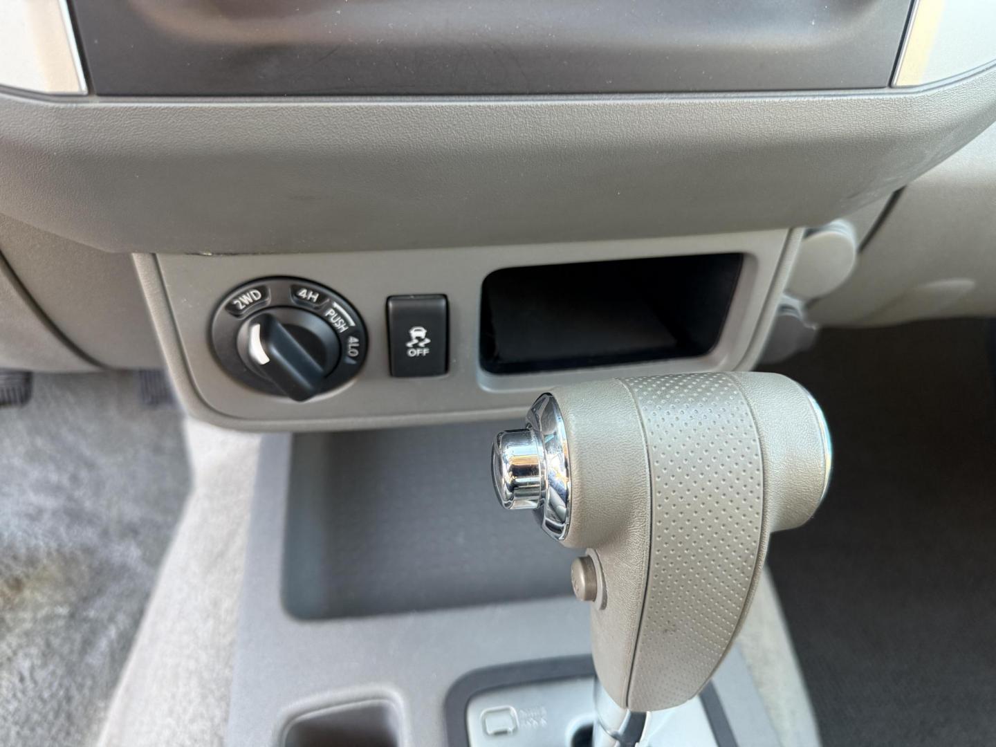 2015 Red /Gray Nissan Frontier S Crew Cab 5AT 4WD (1N6AD0EV7FN) with an 4.0L V6 DOHC 24V engine, 5-Speed Automatic transmission, located at 11115 Chardon Rd. , Chardon, OH, 44024, (440) 214-9705, 41.580246, -81.241943 - This One Owner 2015 Nissan Frontier S Crew Cab 4WD is powered by a robust 4.0L V6 engine mated to a 5-speed automatic transmission, offering a towing capacity of up to 6,100 pounds. It features a Dana 44 rear axle and active brake limited slip differentials, enhancing traction and off-road capabilit - Photo#26