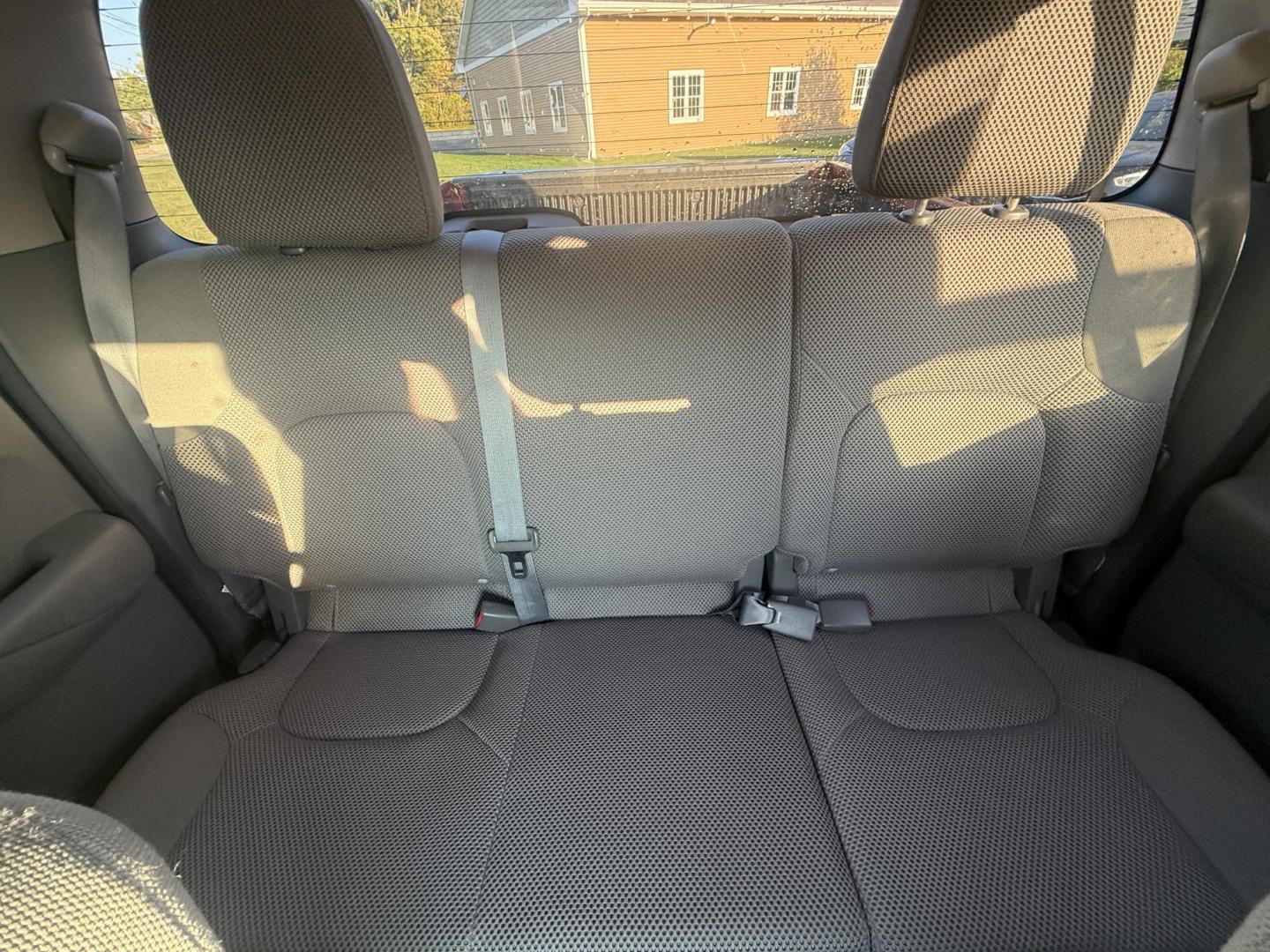 2015 Red /Gray Nissan Frontier S Crew Cab 5AT 4WD (1N6AD0EV7FN) with an 4.0L V6 DOHC 24V engine, 5-Speed Automatic transmission, located at 11115 Chardon Rd. , Chardon, OH, 44024, (440) 214-9705, 41.580246, -81.241943 - This One Owner 2015 Nissan Frontier S Crew Cab 4WD is powered by a robust 4.0L V6 engine mated to a 5-speed automatic transmission, offering a towing capacity of up to 6,100 pounds. It features a Dana 44 rear axle and active brake limited slip differentials, enhancing traction and off-road capabilit - Photo#29