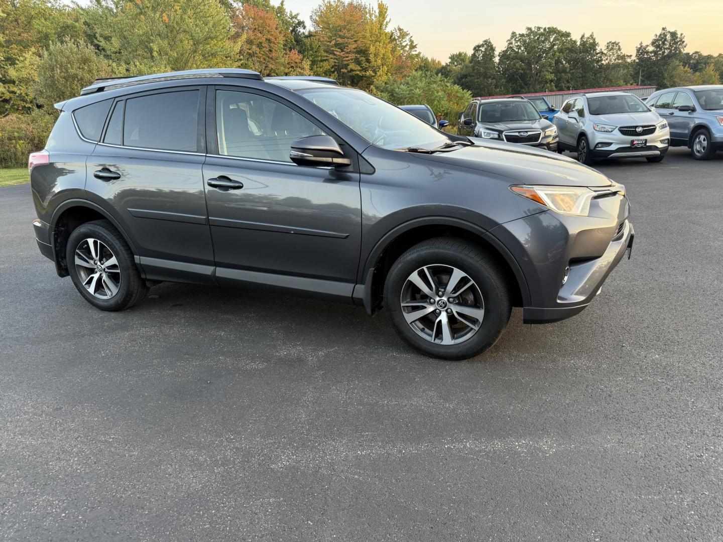 2017 Gray /Black Toyota RAV4 XLE AWD (JTMRFREV4HJ) with an 2.5L I4 DOHC 16V engine, 6A transmission, located at 11115 Chardon Rd. , Chardon, OH, 44024, (440) 214-9705, 41.580246, -81.241943 - One Owner 2017 Toyota RAV4 XLE AWD – Reliable, Versatile, and Packed with Safety Features! Drive with confidence in this one-owner 2017 Toyota RAV4 XLE AWD. Powered by a fuel-efficient 2.5L I4 engine with a 6-speed automatic transmission, this SUV delivers a smooth ride and impressive efficiency - Photo#3