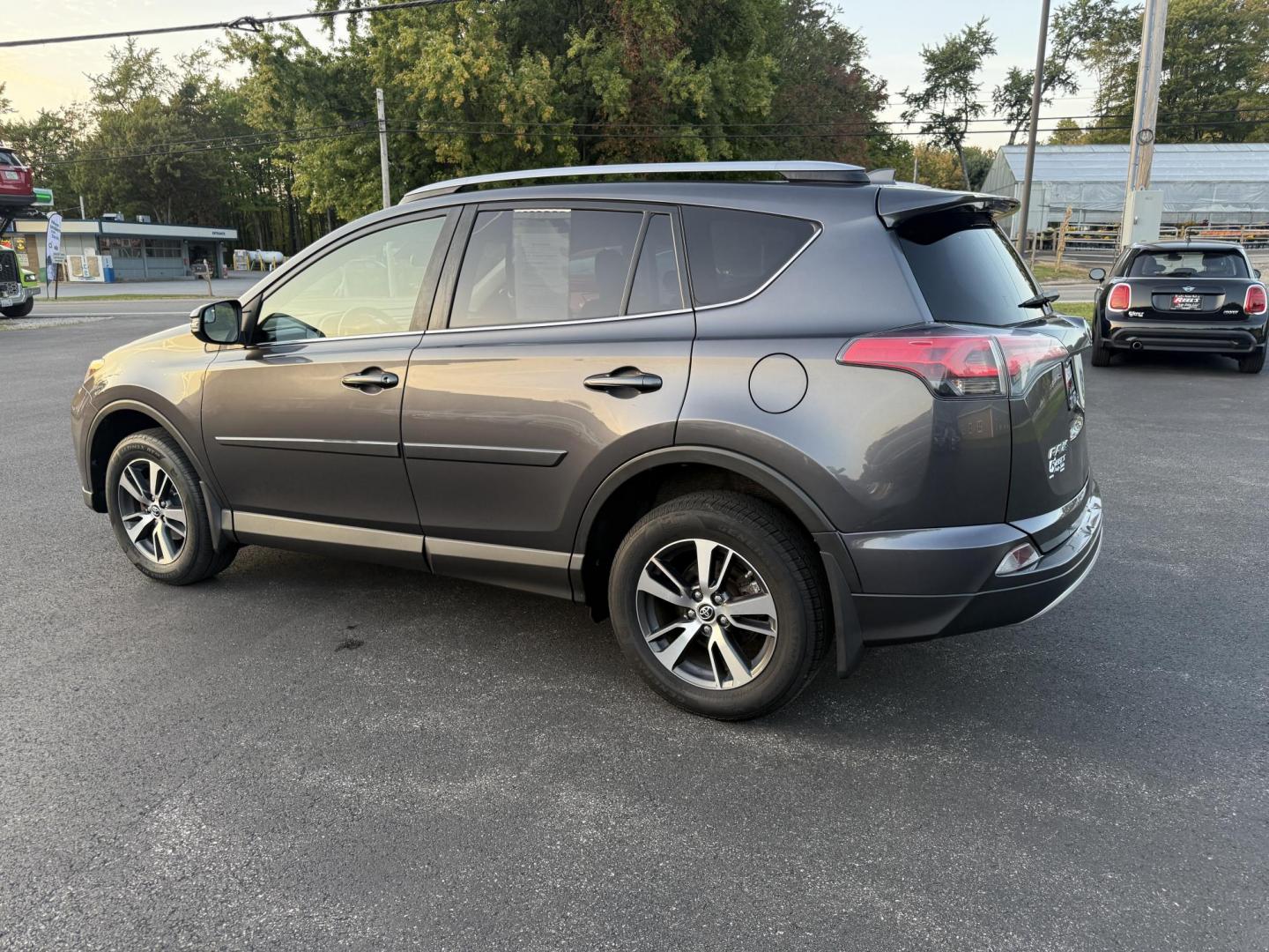2017 Gray /Black Toyota RAV4 XLE AWD (JTMRFREV4HJ) with an 2.5L I4 DOHC 16V engine, 6A transmission, located at 11115 Chardon Rd. , Chardon, OH, 44024, (440) 214-9705, 41.580246, -81.241943 - One Owner 2017 Toyota RAV4 XLE AWD – Reliable, Versatile, and Packed with Safety Features! Drive with confidence in this one-owner 2017 Toyota RAV4 XLE AWD. Powered by a fuel-efficient 2.5L I4 engine with a 6-speed automatic transmission, this SUV delivers a smooth ride and impressive efficiency - Photo#10