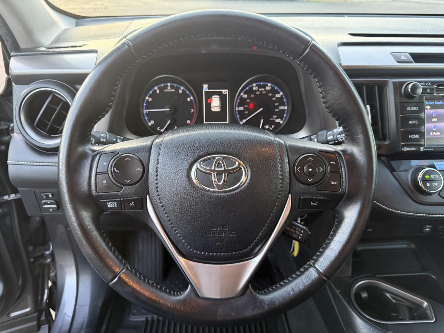 2017 Gray /Black Toyota RAV4 XLE AWD (JTMRFREV4HJ) with an 2.5L I4 DOHC 16V engine, 6A transmission, located at 11115 Chardon Rd. , Chardon, OH, 44024, (440) 214-9705, 41.580246, -81.241943 - One Owner 2017 Toyota RAV4 XLE AWD – Reliable, Versatile, and Packed with Safety Features! Drive with confidence in this one-owner 2017 Toyota RAV4 XLE AWD. Powered by a fuel-efficient 2.5L I4 engine with a 6-speed automatic transmission, this SUV delivers a smooth ride and impressive efficiency - Photo#21