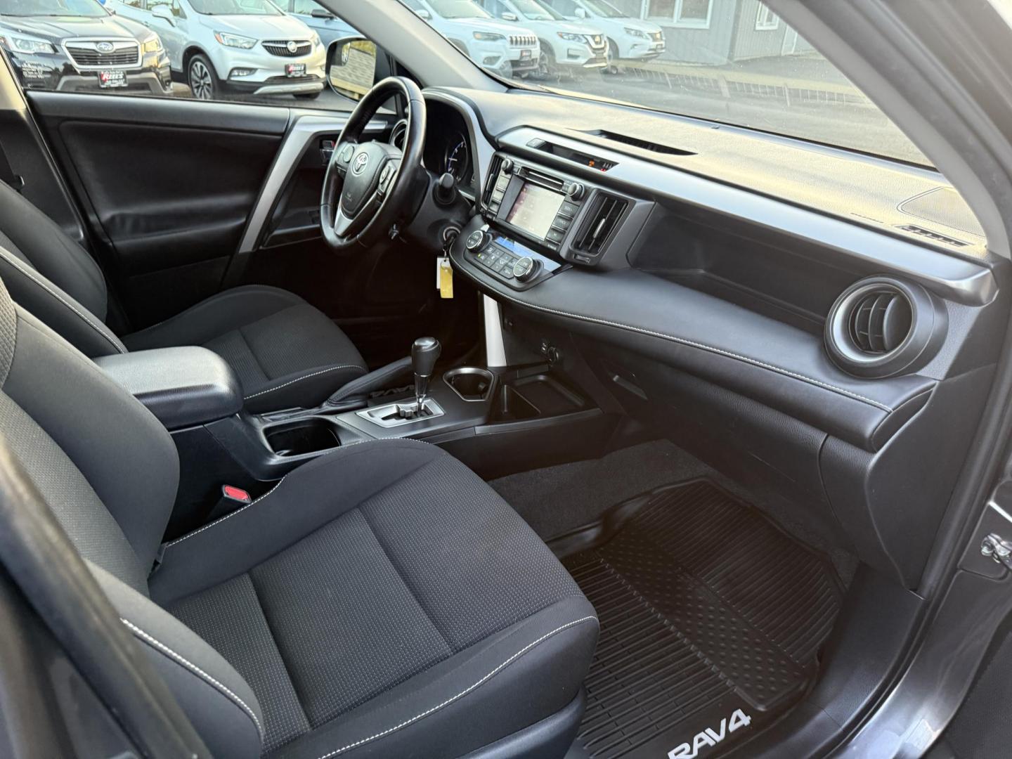 2017 Gray /Black Toyota RAV4 XLE AWD (JTMRFREV4HJ) with an 2.5L I4 DOHC 16V engine, 6A transmission, located at 11115 Chardon Rd. , Chardon, OH, 44024, (440) 214-9705, 41.580246, -81.241943 - One Owner 2017 Toyota RAV4 XLE AWD – Reliable, Versatile, and Packed with Safety Features! Drive with confidence in this one-owner 2017 Toyota RAV4 XLE AWD. Powered by a fuel-efficient 2.5L I4 engine with a 6-speed automatic transmission, this SUV delivers a smooth ride and impressive efficiency - Photo#39