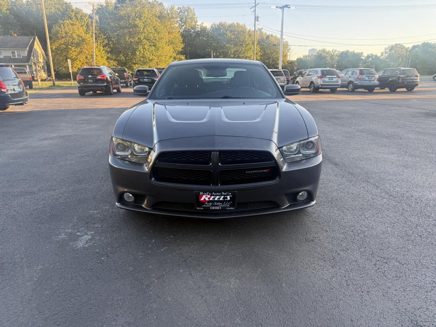 2014 Gray /Black Dodge Charger R/T AWD (2C3CDXDT6EH) with an 5.7L V8 OHV 16V engine, 5-Speed Automatic transmission, located at 547 E. Main St., Orwell, OH, 44076, (440) 437-5893, 41.535435, -80.847855 - This 2014 Dodge Charger R/T AWD is a powerful and stylish full-size sedan equipped with a 5.7L HEMI V8 engine that delivers 370 horsepower and 395 lb-ft of torque. Featuring a 5-speed automatic transmission and all-wheel drive, it accelerates from 0 to 60 mph in approximately 5.2 seconds, offering i - Photo#1