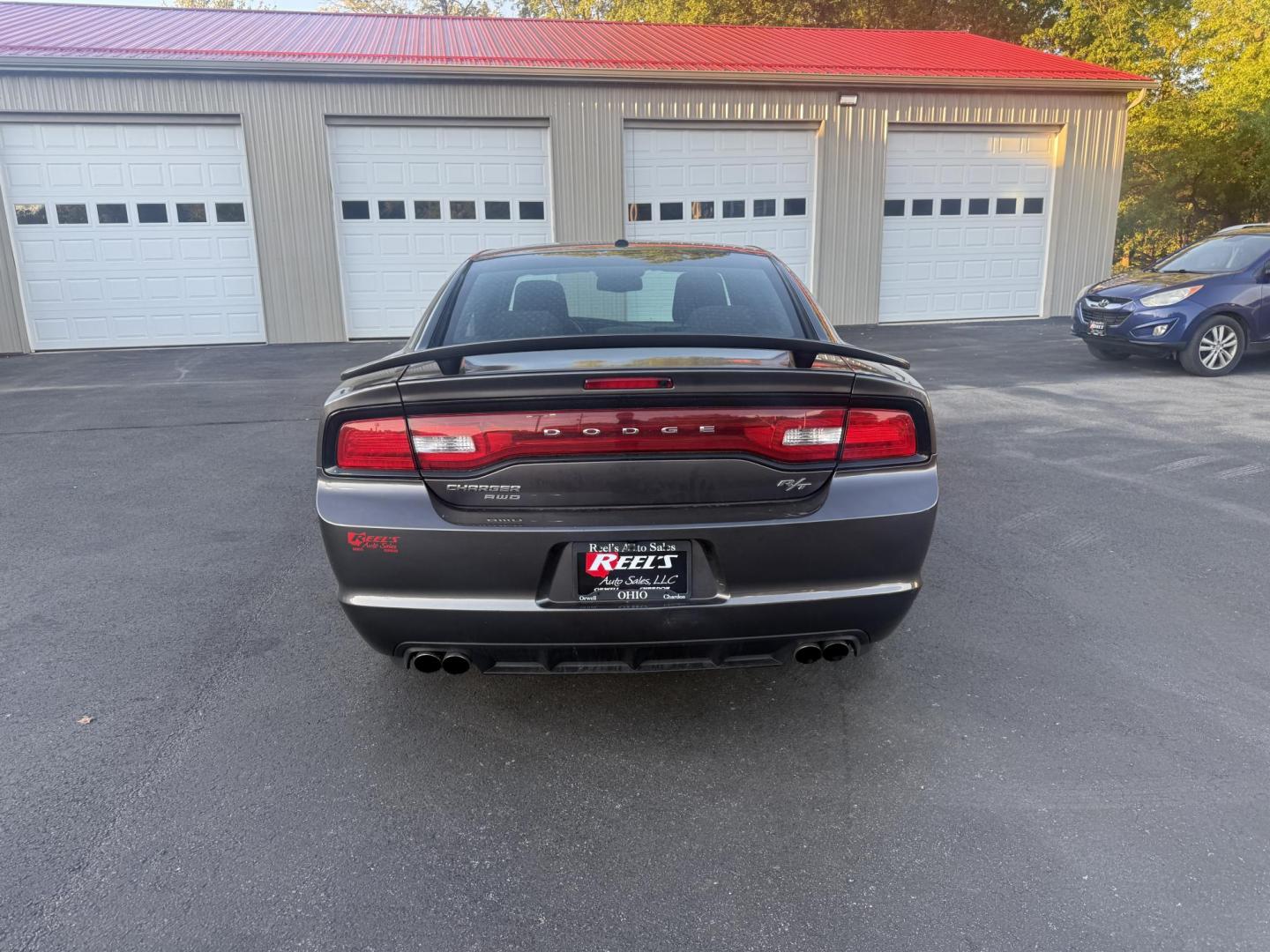 2014 Gray /Black Dodge Charger R/T AWD (2C3CDXDT6EH) with an 5.7L V8 OHV 16V engine, 5-Speed Automatic transmission, located at 547 E. Main St., Orwell, OH, 44076, (440) 437-5893, 41.535435, -80.847855 - This 2014 Dodge Charger R/T AWD is a powerful and stylish full-size sedan equipped with a 5.7L HEMI V8 engine that delivers 370 horsepower and 395 lb-ft of torque. Featuring a 5-speed automatic transmission and all-wheel drive, it accelerates from 0 to 60 mph in approximately 5.2 seconds, offering i - Photo#8