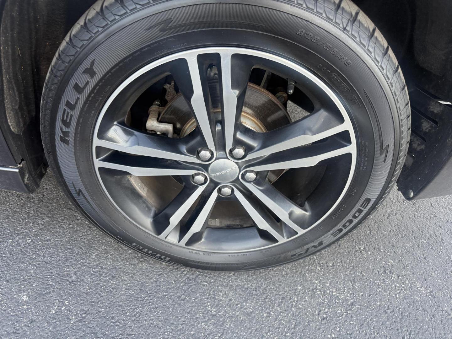 2014 Gray /Black Dodge Charger R/T AWD (2C3CDXDT6EH) with an 5.7L V8 OHV 16V engine, 5-Speed Automatic transmission, located at 547 E. Main St., Orwell, OH, 44076, (440) 437-5893, 41.535435, -80.847855 - This 2014 Dodge Charger R/T AWD is a powerful and stylish full-size sedan equipped with a 5.7L HEMI V8 engine that delivers 370 horsepower and 395 lb-ft of torque. Featuring a 5-speed automatic transmission and all-wheel drive, it accelerates from 0 to 60 mph in approximately 5.2 seconds, offering i - Photo#11