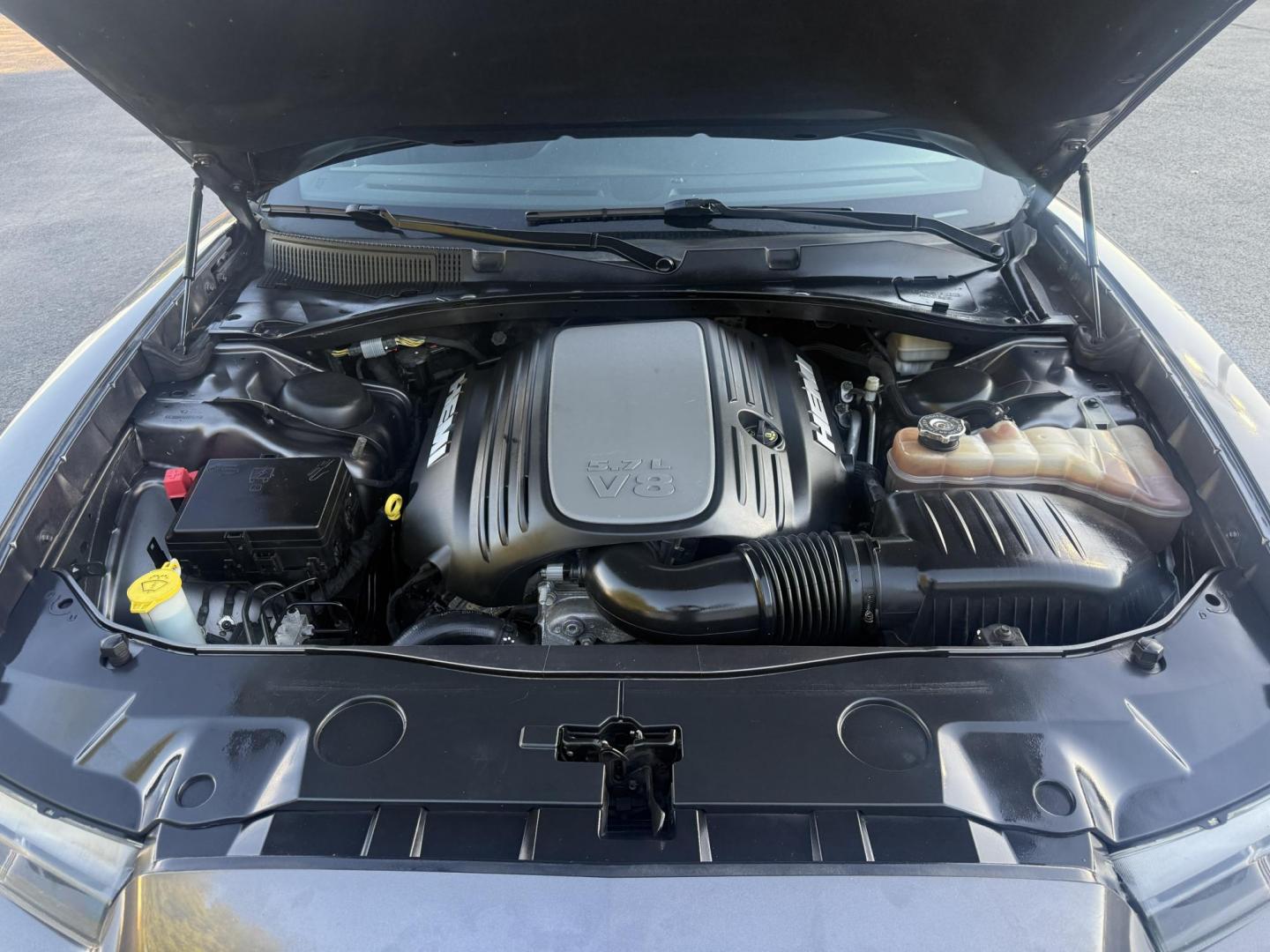 2014 Gray /Black Dodge Charger R/T AWD (2C3CDXDT6EH) with an 5.7L V8 OHV 16V engine, 5-Speed Automatic transmission, located at 547 E. Main St., Orwell, OH, 44076, (440) 437-5893, 41.535435, -80.847855 - This 2014 Dodge Charger R/T AWD is a powerful and stylish full-size sedan equipped with a 5.7L HEMI V8 engine that delivers 370 horsepower and 395 lb-ft of torque. Featuring a 5-speed automatic transmission and all-wheel drive, it accelerates from 0 to 60 mph in approximately 5.2 seconds, offering i - Photo#14