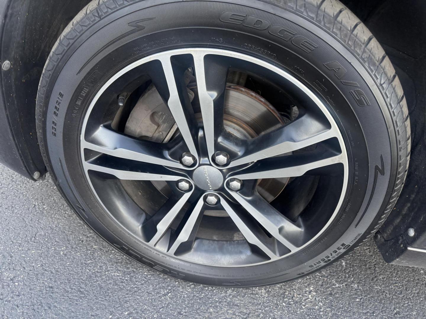 2014 Gray /Black Dodge Charger R/T AWD (2C3CDXDT6EH) with an 5.7L V8 OHV 16V engine, 5-Speed Automatic transmission, located at 547 E. Main St., Orwell, OH, 44076, (440) 437-5893, 41.535435, -80.847855 - This 2014 Dodge Charger R/T AWD is a powerful and stylish full-size sedan equipped with a 5.7L HEMI V8 engine that delivers 370 horsepower and 395 lb-ft of torque. Featuring a 5-speed automatic transmission and all-wheel drive, it accelerates from 0 to 60 mph in approximately 5.2 seconds, offering i - Photo#13
