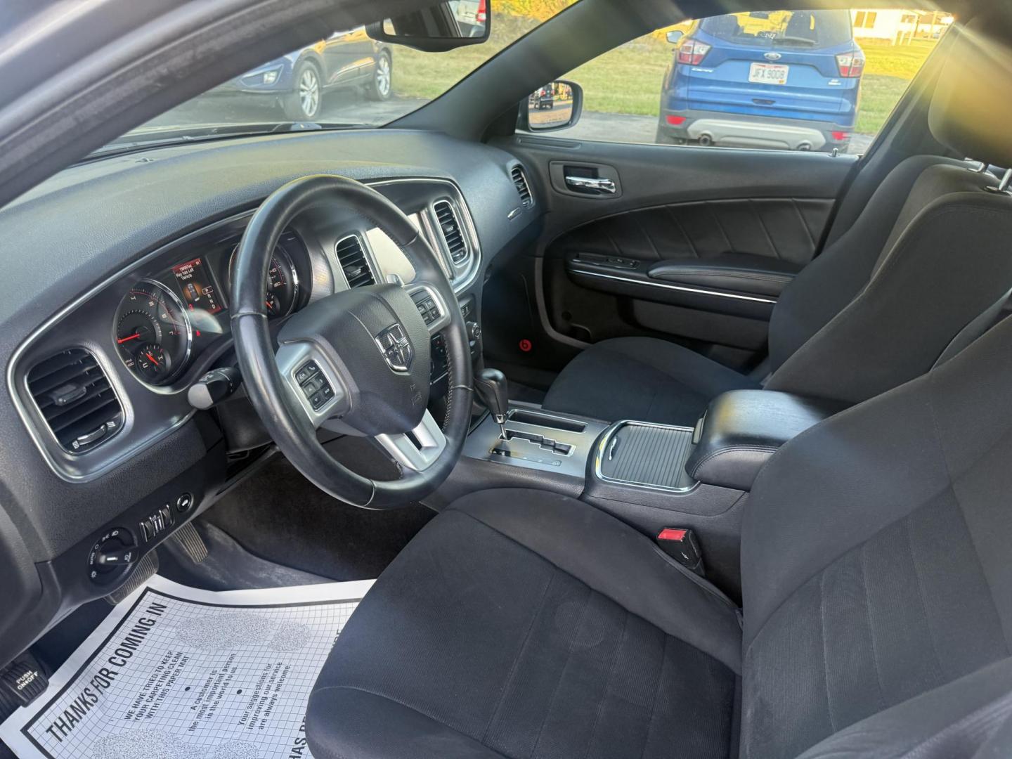 2014 Gray /Black Dodge Charger R/T AWD (2C3CDXDT6EH) with an 5.7L V8 OHV 16V engine, 5-Speed Automatic transmission, located at 547 E. Main St., Orwell, OH, 44076, (440) 437-5893, 41.535435, -80.847855 - This 2014 Dodge Charger R/T AWD is a powerful and stylish full-size sedan equipped with a 5.7L HEMI V8 engine that delivers 370 horsepower and 395 lb-ft of torque. Featuring a 5-speed automatic transmission and all-wheel drive, it accelerates from 0 to 60 mph in approximately 5.2 seconds, offering i - Photo#16