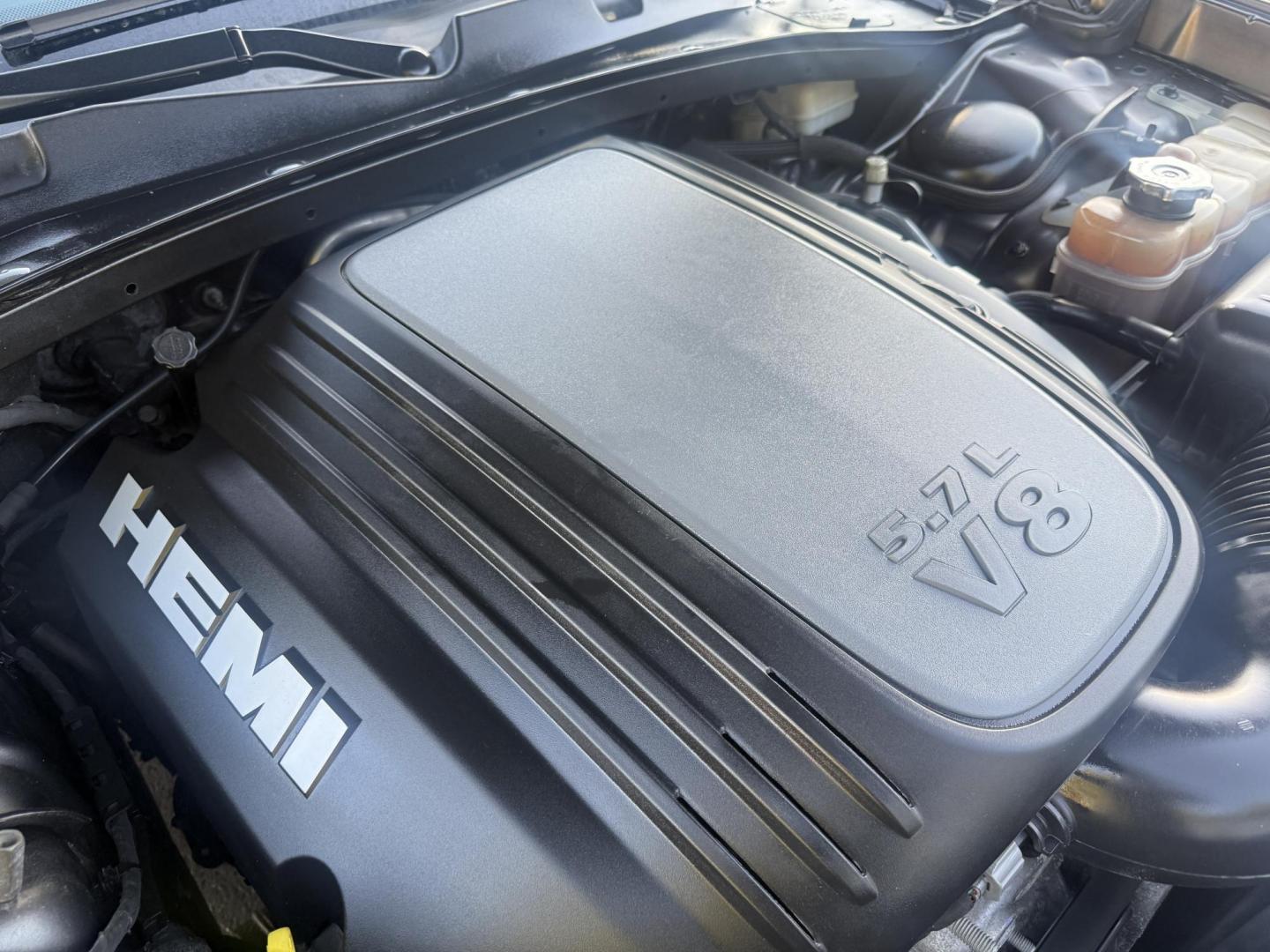 2014 Gray /Black Dodge Charger R/T AWD (2C3CDXDT6EH) with an 5.7L V8 OHV 16V engine, 5-Speed Automatic transmission, located at 547 E. Main St., Orwell, OH, 44076, (440) 437-5893, 41.535435, -80.847855 - This 2014 Dodge Charger R/T AWD is a powerful and stylish full-size sedan equipped with a 5.7L HEMI V8 engine that delivers 370 horsepower and 395 lb-ft of torque. Featuring a 5-speed automatic transmission and all-wheel drive, it accelerates from 0 to 60 mph in approximately 5.2 seconds, offering i - Photo#15