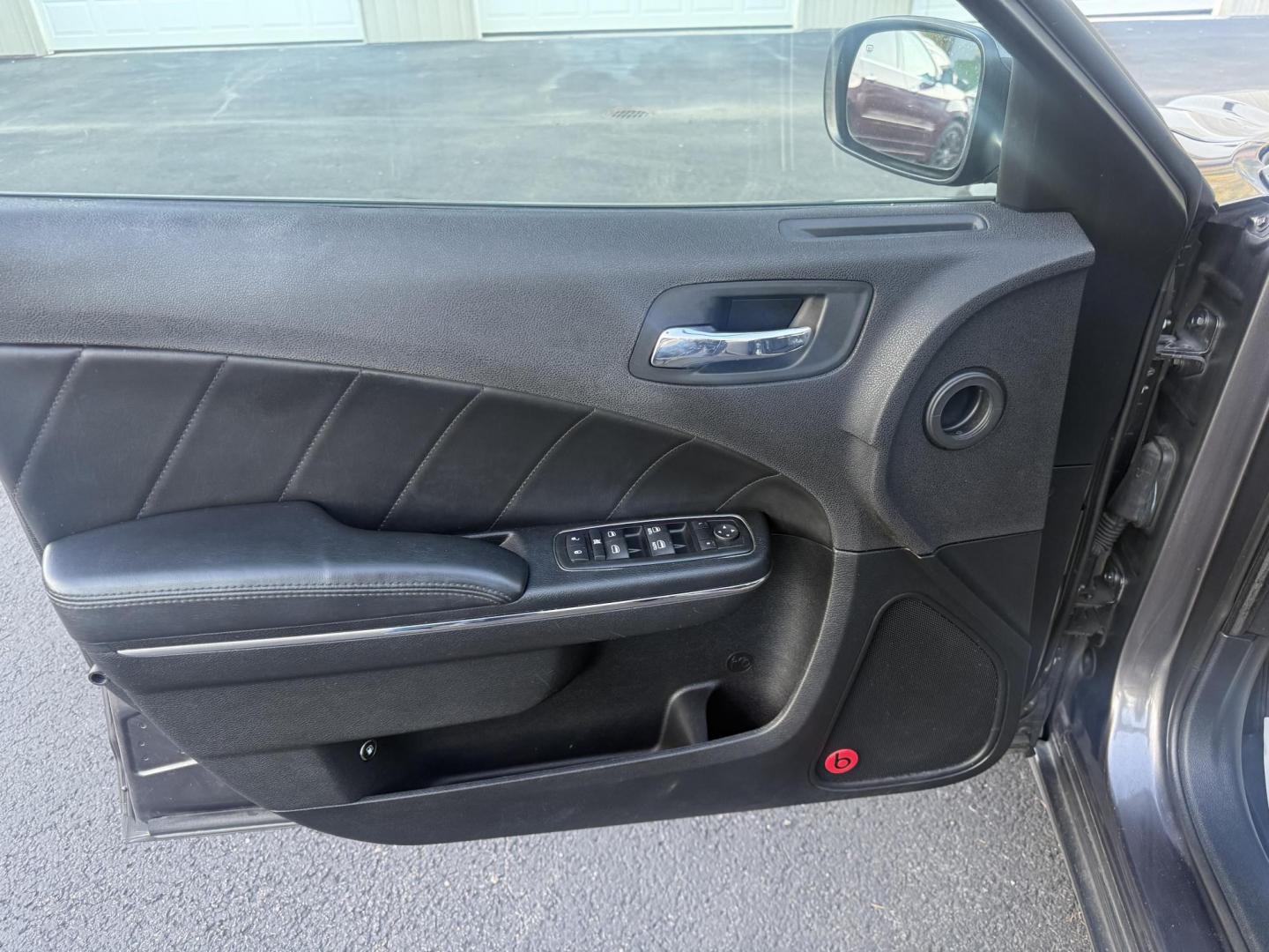 2014 Gray /Black Dodge Charger R/T AWD (2C3CDXDT6EH) with an 5.7L V8 OHV 16V engine, 5-Speed Automatic transmission, located at 547 E. Main St., Orwell, OH, 44076, (440) 437-5893, 41.535435, -80.847855 - This 2014 Dodge Charger R/T AWD is a powerful and stylish full-size sedan equipped with a 5.7L HEMI V8 engine that delivers 370 horsepower and 395 lb-ft of torque. Featuring a 5-speed automatic transmission and all-wheel drive, it accelerates from 0 to 60 mph in approximately 5.2 seconds, offering i - Photo#17