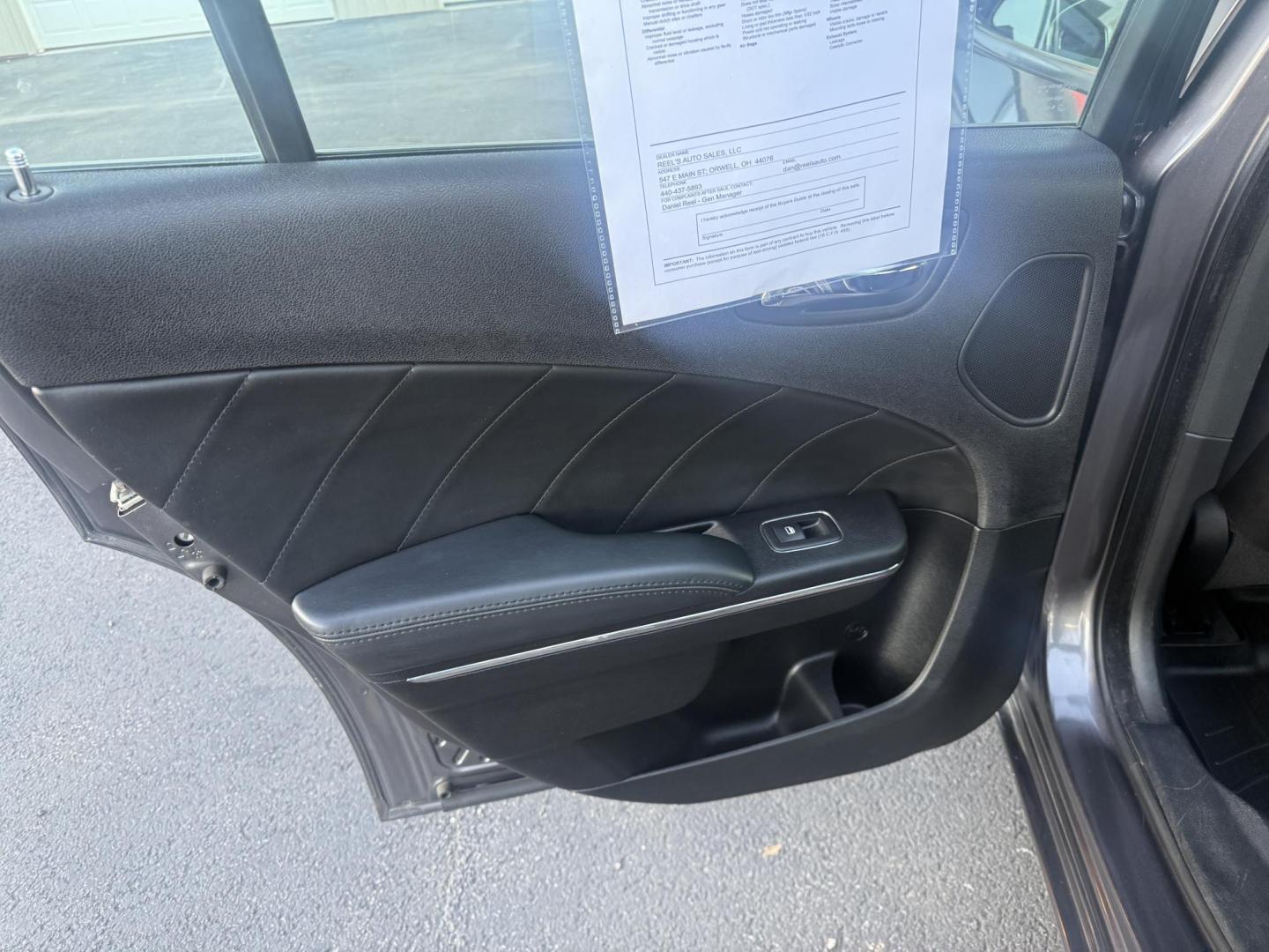 2014 Gray /Black Dodge Charger R/T AWD (2C3CDXDT6EH) with an 5.7L V8 OHV 16V engine, 5-Speed Automatic transmission, located at 547 E. Main St., Orwell, OH, 44076, (440) 437-5893, 41.535435, -80.847855 - This 2014 Dodge Charger R/T AWD is a powerful and stylish full-size sedan equipped with a 5.7L HEMI V8 engine that delivers 370 horsepower and 395 lb-ft of torque. Featuring a 5-speed automatic transmission and all-wheel drive, it accelerates from 0 to 60 mph in approximately 5.2 seconds, offering i - Photo#34
