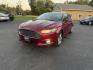 2015 Red /Black Ford Fusion SE (3FA6P0H98FR) with an 2.0L I4 DOHC 16V Turbo engine, 6-Speed Automatic transmission, located at 11115 Chardon Rd. , Chardon, OH, 44024, (440) 214-9705, 41.580246, -81.241943 - This One Owner 2015 Ford Fusion SE is a stylish and efficient midsize sedan powered by a 2.0L I4 EcoBoost engine paired with a 6-speed automatic transmission. This combination delivers a satisfying balance of performance and fuel economy, achieving up to 33 MPG on the highway. The SE trim offers com - Photo#0