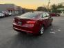 2015 Red /Black Ford Fusion SE (3FA6P0H98FR) with an 2.0L I4 DOHC 16V Turbo engine, 6-Speed Automatic transmission, located at 11115 Chardon Rd. , Chardon, OH, 44024, (440) 214-9705, 41.580246, -81.241943 - This One Owner 2015 Ford Fusion SE is a stylish and efficient midsize sedan powered by a 2.0L I4 EcoBoost engine paired with a 6-speed automatic transmission. This combination delivers a satisfying balance of performance and fuel economy, achieving up to 33 MPG on the highway. The SE trim offers com - Photo#7