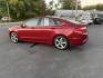 2015 Red /Black Ford Fusion SE (3FA6P0H98FR) with an 2.0L I4 DOHC 16V Turbo engine, 6-Speed Automatic transmission, located at 11115 Chardon Rd. , Chardon, OH, 44024, (440) 214-9705, 41.580246, -81.241943 - This One Owner 2015 Ford Fusion SE is a stylish and efficient midsize sedan powered by a 2.0L I4 EcoBoost engine paired with a 6-speed automatic transmission. This combination delivers a satisfying balance of performance and fuel economy, achieving up to 33 MPG on the highway. The SE trim offers com - Photo#10