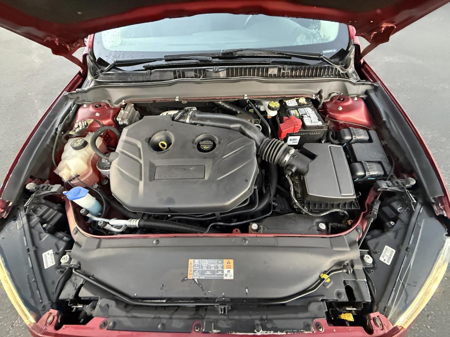2015 Red /Black Ford Fusion SE (3FA6P0H98FR) with an 2.0L I4 DOHC 16V Turbo engine, 6-Speed Automatic transmission, located at 11115 Chardon Rd. , Chardon, OH, 44024, (440) 214-9705, 41.580246, -81.241943 - This One Owner 2015 Ford Fusion SE is a stylish and efficient midsize sedan powered by a 2.0L I4 EcoBoost engine paired with a 6-speed automatic transmission. This combination delivers a satisfying balance of performance and fuel economy, achieving up to 33 MPG on the highway. The SE trim offers com - Photo#14