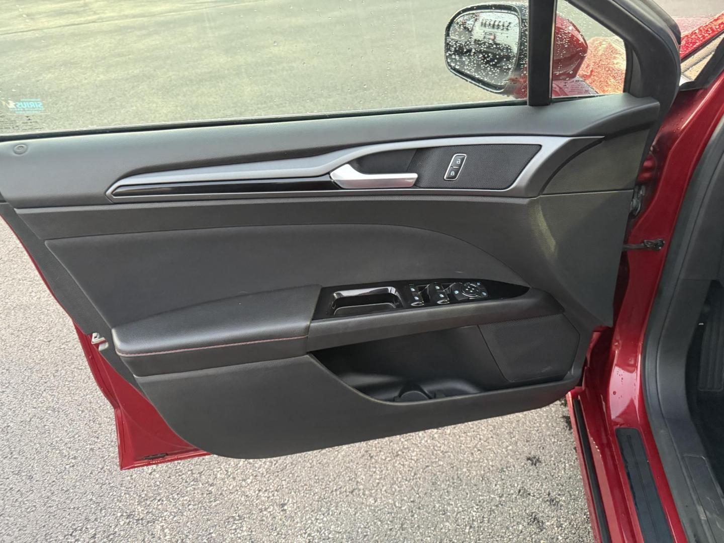 2015 Red /Black Ford Fusion SE (3FA6P0H98FR) with an 2.0L I4 DOHC 16V Turbo engine, 6-Speed Automatic transmission, located at 11115 Chardon Rd. , Chardon, OH, 44024, (440) 214-9705, 41.580246, -81.241943 - This One Owner 2015 Ford Fusion SE is a stylish and efficient midsize sedan powered by a 2.0L I4 EcoBoost engine paired with a 6-speed automatic transmission. This combination delivers a satisfying balance of performance and fuel economy, achieving up to 33 MPG on the highway. The SE trim offers com - Photo#16