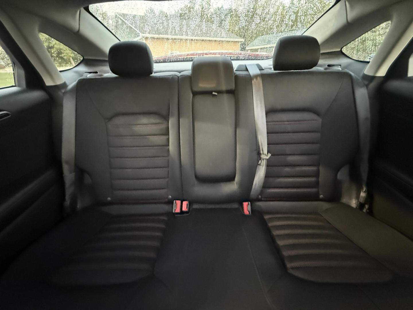2015 Red /Black Ford Fusion SE (3FA6P0H98FR) with an 2.0L I4 DOHC 16V Turbo engine, 6-Speed Automatic transmission, located at 11115 Chardon Rd. , Chardon, OH, 44024, (440) 214-9705, 41.580246, -81.241943 - This One Owner 2015 Ford Fusion SE is a stylish and efficient midsize sedan powered by a 2.0L I4 EcoBoost engine paired with a 6-speed automatic transmission. This combination delivers a satisfying balance of performance and fuel economy, achieving up to 33 MPG on the highway. The SE trim offers com - Photo#30