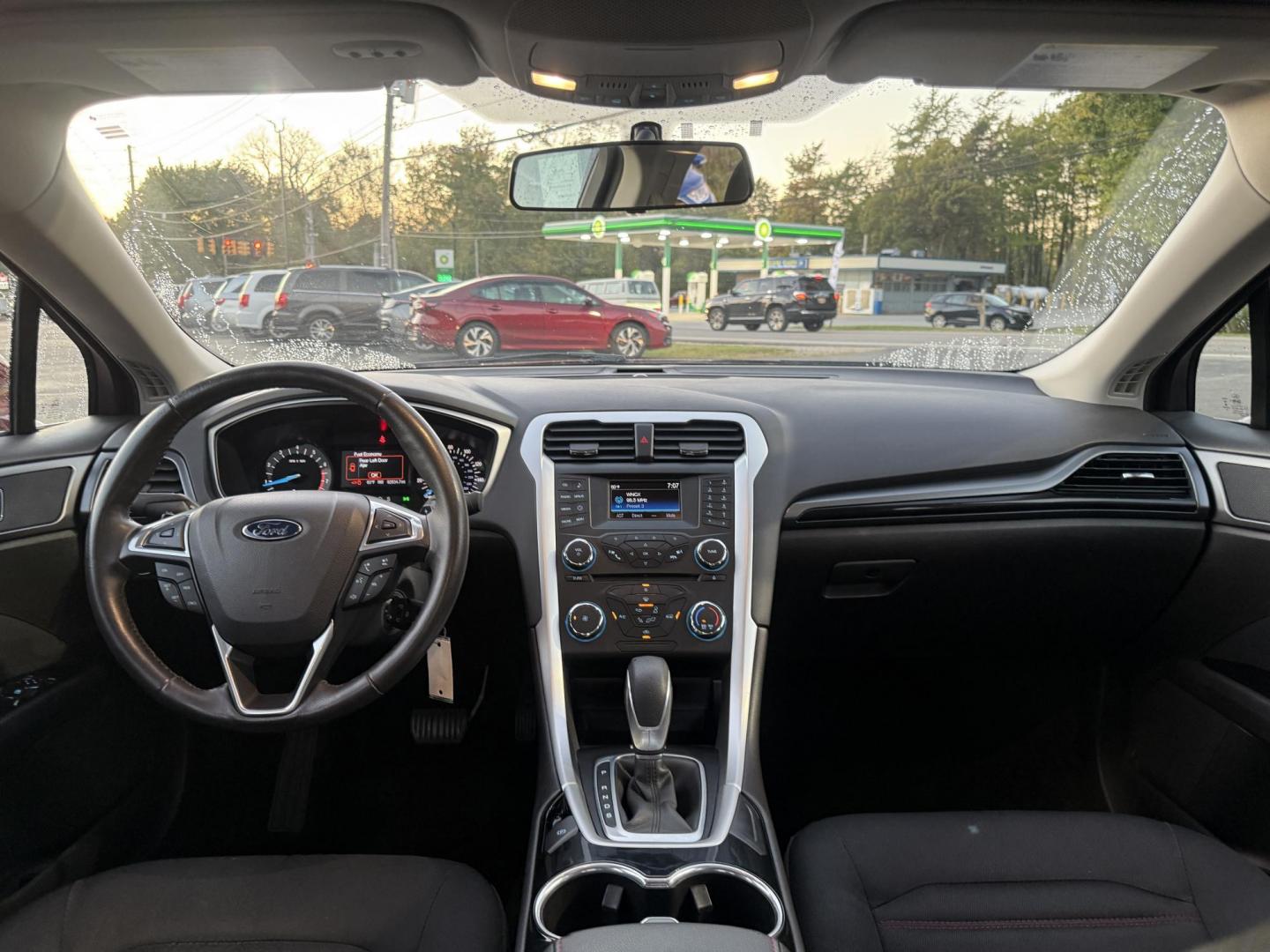 2015 Red /Black Ford Fusion SE (3FA6P0H98FR) with an 2.0L I4 DOHC 16V Turbo engine, 6-Speed Automatic transmission, located at 11115 Chardon Rd. , Chardon, OH, 44024, (440) 214-9705, 41.580246, -81.241943 - This One Owner 2015 Ford Fusion SE is a stylish and efficient midsize sedan powered by a 2.0L I4 EcoBoost engine paired with a 6-speed automatic transmission. This combination delivers a satisfying balance of performance and fuel economy, achieving up to 33 MPG on the highway. The SE trim offers com - Photo#34