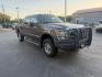 2016 Tan /Gray Ford F-250 SD XLT Crew Cab 4WD (1FT7W2B61GE) with an 6.2L V8 OHV 16V engine, 6-Speed Automatic transmission, located at 547 E. Main St., Orwell, OH, 44076, (440) 437-5893, 41.535435, -80.847855 - This 2016 Ford F-250 XLT Crew Cab is a powerful and capable heavy-duty pickup truck, equipped with a robust 6.2L V8 engine and a 6-speed automatic transmission. Designed for serious work, it features 3.73 gearing and boasts an impressive towing capacity of up to 12,500 pounds, making it ideal for ha - Photo#2