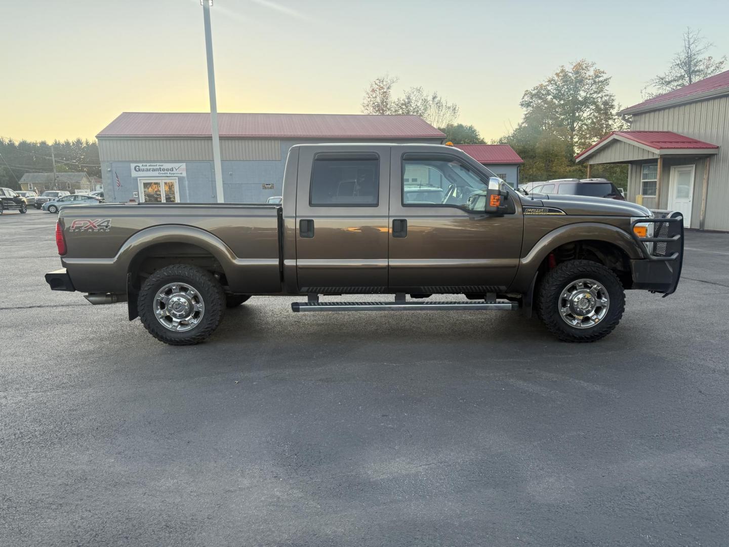 2016 Tan /Gray Ford F-250 SD XLT Crew Cab 4WD (1FT7W2B61GE) with an 6.2L V8 OHV 16V engine, 6-Speed Automatic transmission, located at 547 E. Main St., Orwell, OH, 44076, (440) 437-5893, 41.535435, -80.847855 - This 2016 Ford F-250 XLT Crew Cab is a powerful and capable heavy-duty pickup truck, equipped with a robust 6.2L V8 engine and a 6-speed automatic transmission. Designed for serious work, it features 3.73 gearing and boasts an impressive towing capacity of up to 12,500 pounds, making it ideal for ha - Photo#6