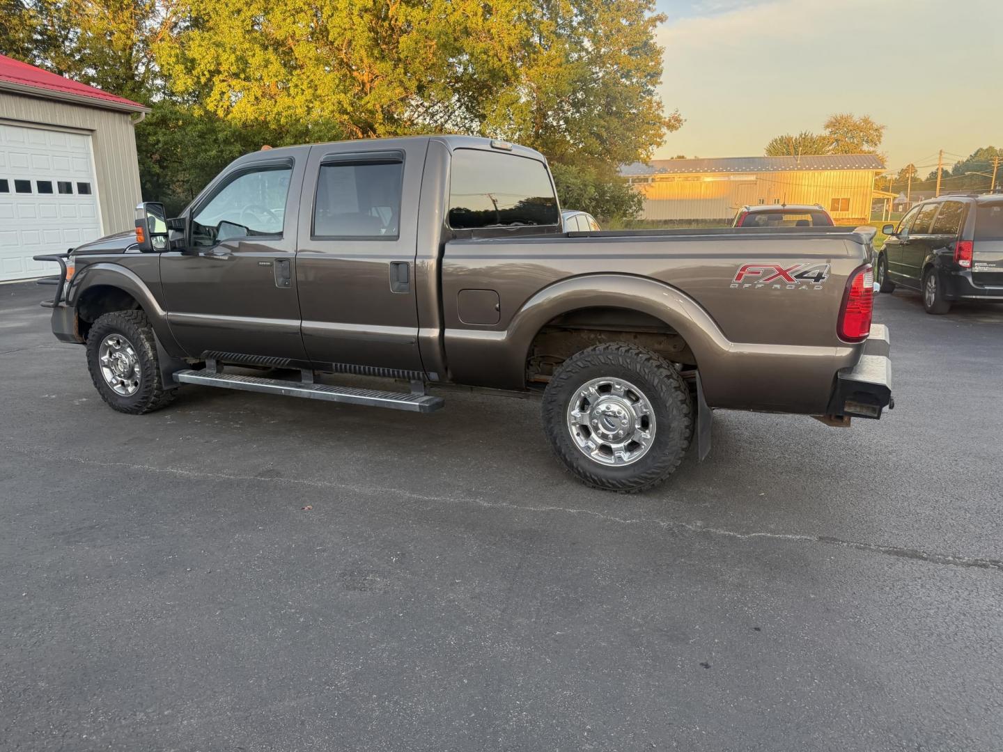 2016 Tan /Gray Ford F-250 SD XLT Crew Cab 4WD (1FT7W2B61GE) with an 6.2L V8 OHV 16V engine, 6-Speed Automatic transmission, located at 547 E. Main St., Orwell, OH, 44076, (440) 437-5893, 41.535435, -80.847855 - This 2016 Ford F-250 XLT Crew Cab is a powerful and capable heavy-duty pickup truck, equipped with a robust 6.2L V8 engine and a 6-speed automatic transmission. Designed for serious work, it features 3.73 gearing and boasts an impressive towing capacity of up to 12,500 pounds, making it ideal for ha - Photo#12