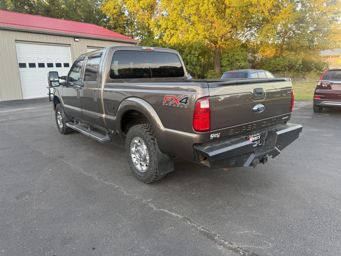 2016 Tan /Gray Ford F-250 SD XLT Crew Cab 4WD (1FT7W2B61GE) with an 6.2L V8 OHV 16V engine, 6-Speed Automatic transmission, located at 547 E. Main St., Orwell, OH, 44076, (440) 437-5893, 41.535435, -80.847855 - This 2016 Ford F-250 XLT Crew Cab is a powerful and capable heavy-duty pickup truck, equipped with a robust 6.2L V8 engine and a 6-speed automatic transmission. Designed for serious work, it features 3.73 gearing and boasts an impressive towing capacity of up to 12,500 pounds, making it ideal for ha - Photo#11