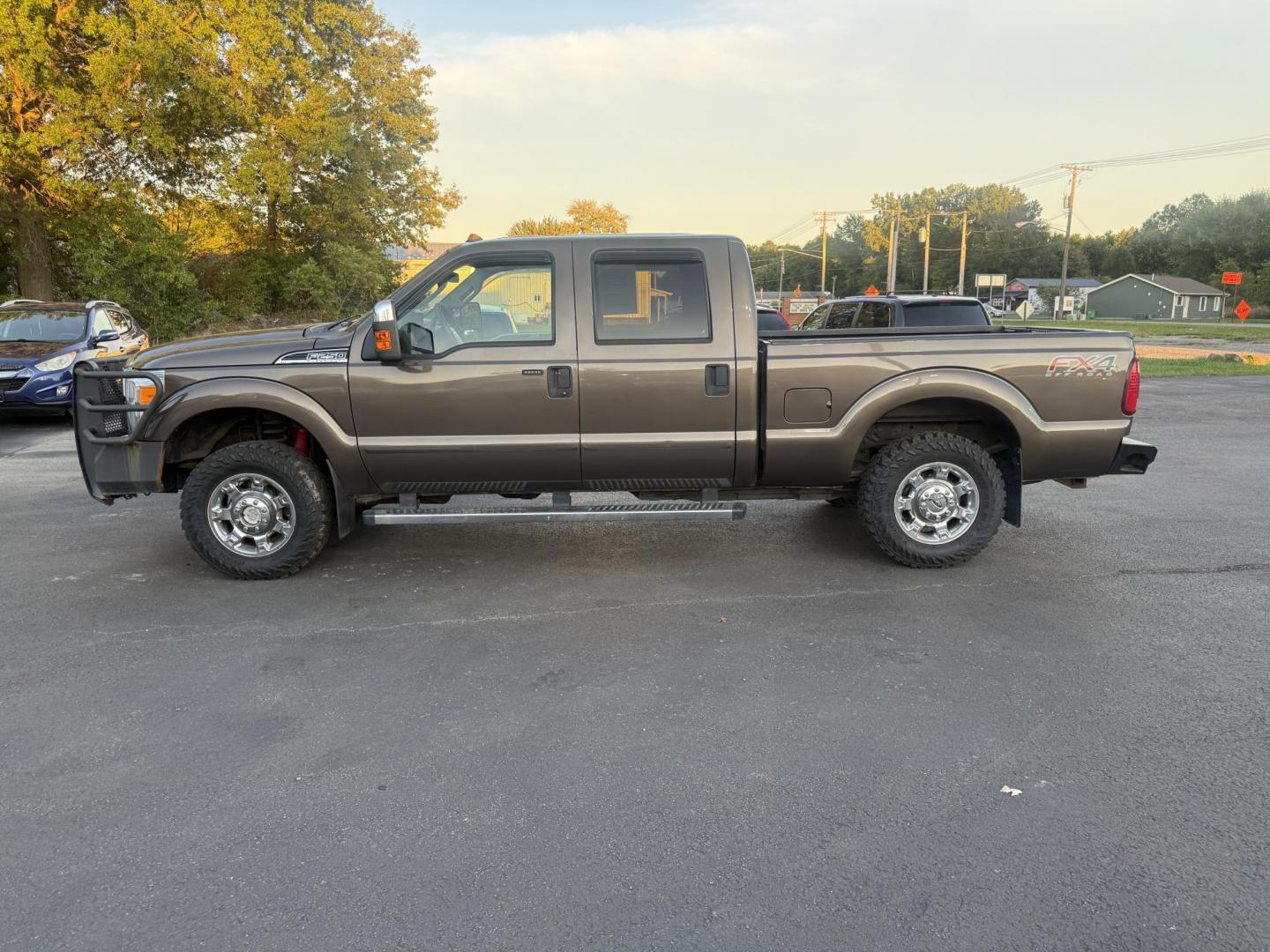 2016 Tan /Gray Ford F-250 SD XLT Crew Cab 4WD (1FT7W2B61GE) with an 6.2L V8 OHV 16V engine, 6-Speed Automatic transmission, located at 547 E. Main St., Orwell, OH, 44076, (440) 437-5893, 41.535435, -80.847855 - This 2016 Ford F-250 XLT Crew Cab is a powerful and capable heavy-duty pickup truck, equipped with a robust 6.2L V8 engine and a 6-speed automatic transmission. Designed for serious work, it features 3.73 gearing and boasts an impressive towing capacity of up to 12,500 pounds, making it ideal for ha - Photo#14