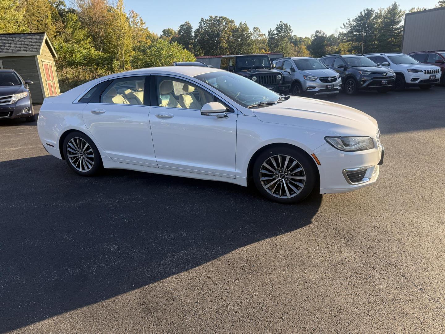 2017 White /White Lincoln MKZ Hybrid Select (3LN6L5LU2HR) with an 2.0L L4 DOHC 16V HYBRID engine, Automatic transmission, located at 547 E. Main St., Orwell, OH, 44076, (440) 437-5893, 41.535435, -80.847855 - Photo#3