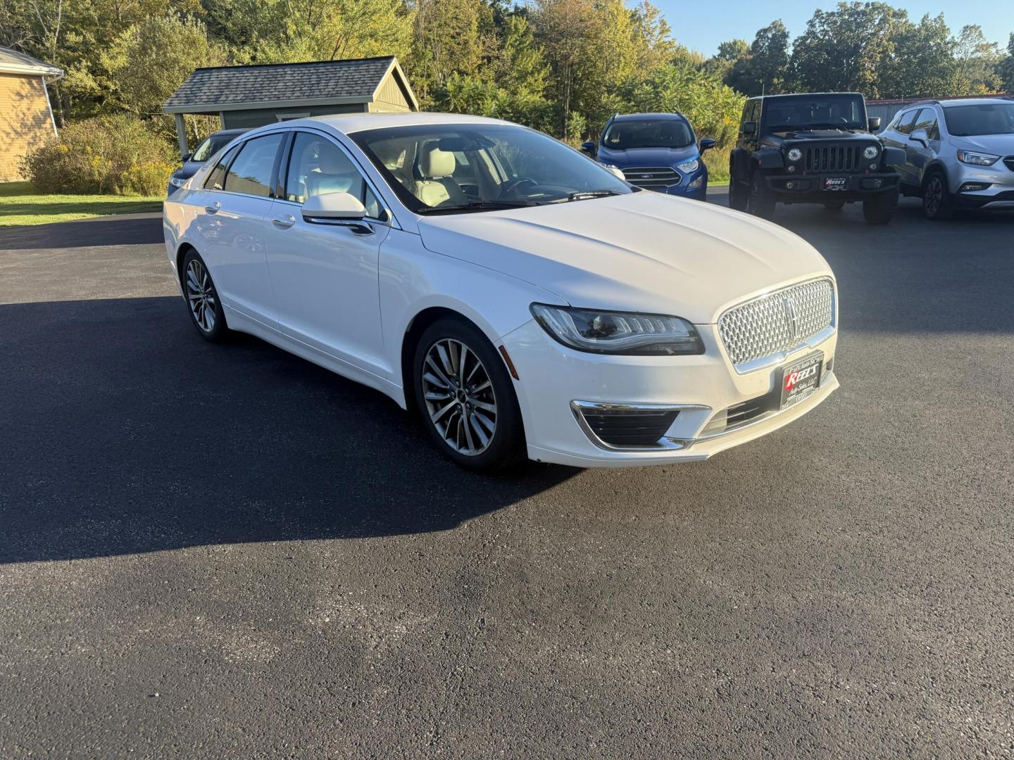 2017 White /White Lincoln MKZ Hybrid Select (3LN6L5LU2HR) with an 2.0L L4 DOHC 16V HYBRID engine, Automatic transmission, located at 547 E. Main St., Orwell, OH, 44076, (440) 437-5893, 41.535435, -80.847855 - Photo#2