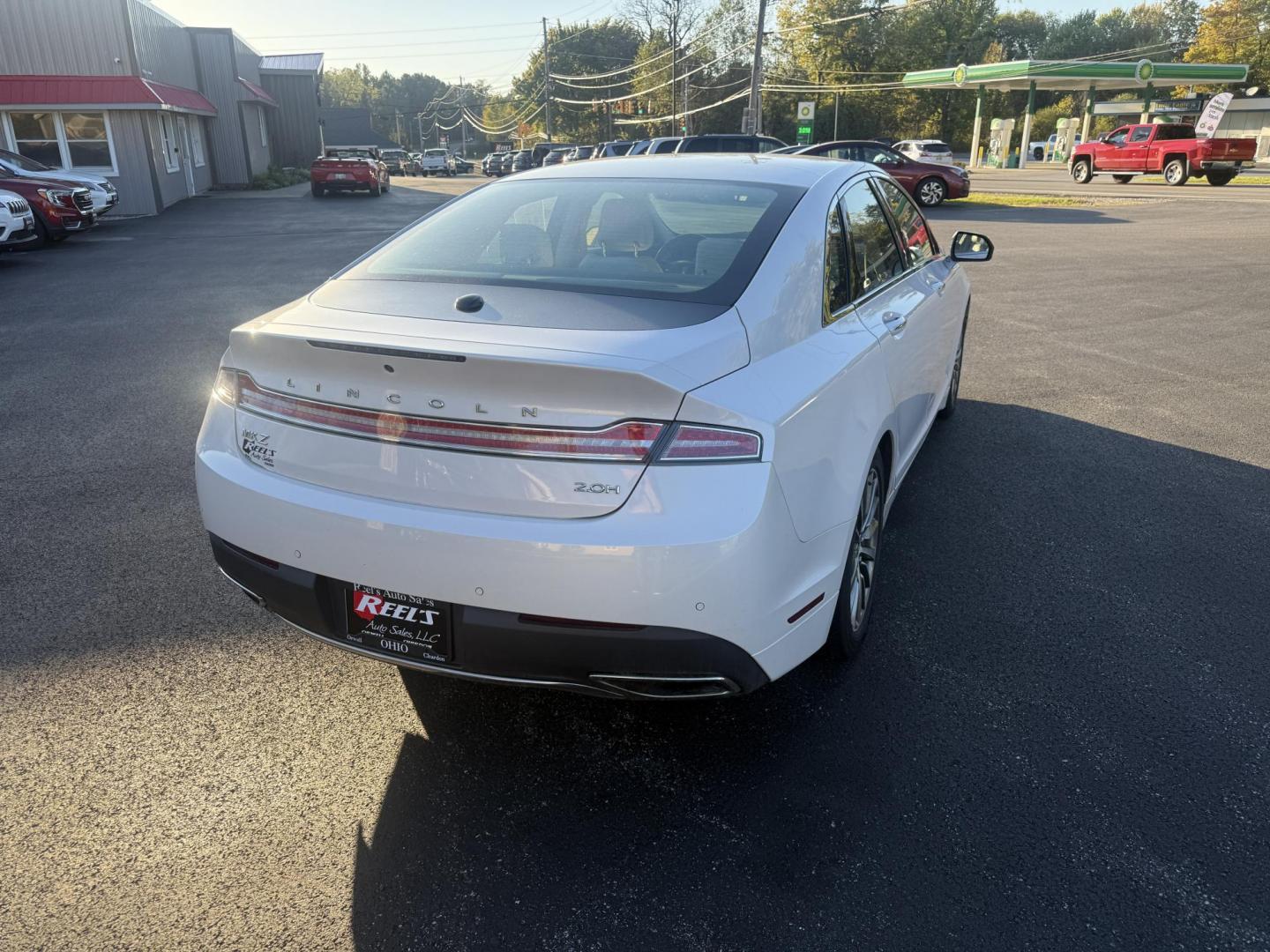 2017 White /White Lincoln MKZ Hybrid Select (3LN6L5LU2HR) with an 2.0L L4 DOHC 16V HYBRID engine, Automatic transmission, located at 547 E. Main St., Orwell, OH, 44076, (440) 437-5893, 41.535435, -80.847855 - Photo#7