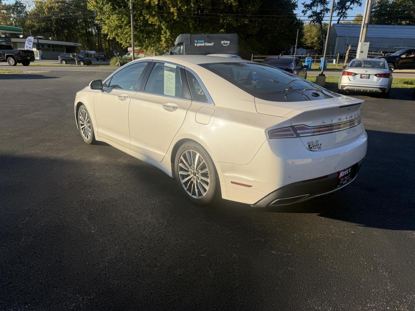 2017 White /White Lincoln MKZ Hybrid Select (3LN6L5LU2HR) with an 2.0L L4 DOHC 16V HYBRID engine, Automatic transmission, located at 547 E. Main St., Orwell, OH, 44076, (440) 437-5893, 41.535435, -80.847855 - Photo#9