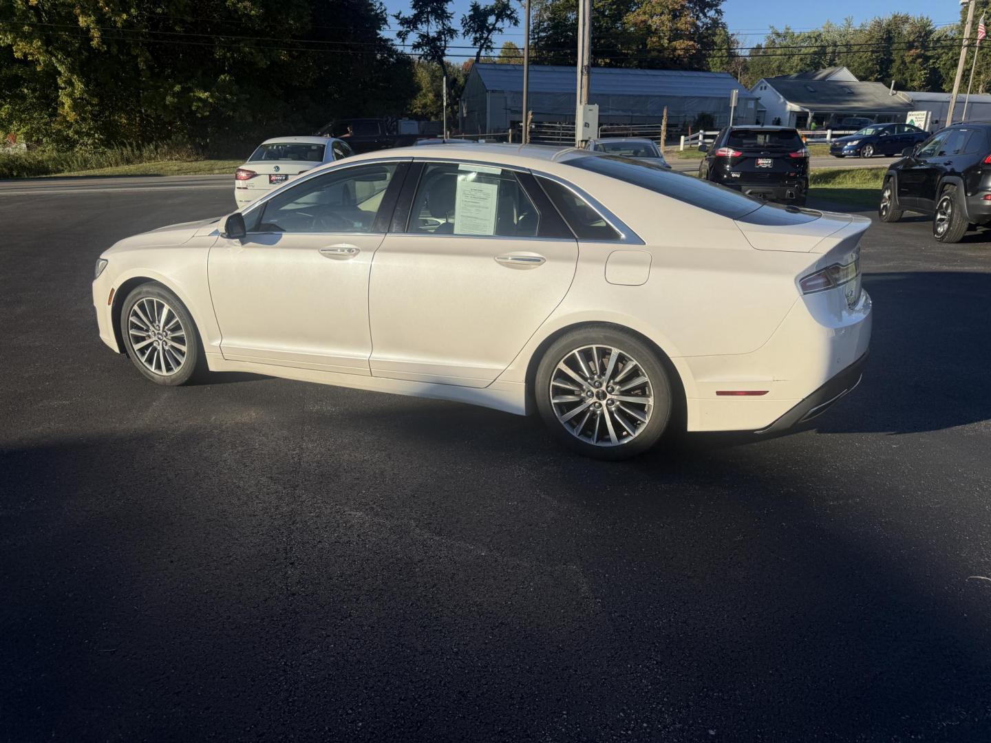 2017 White /White Lincoln MKZ Hybrid Select (3LN6L5LU2HR) with an 2.0L L4 DOHC 16V HYBRID engine, Automatic transmission, located at 547 E. Main St., Orwell, OH, 44076, (440) 437-5893, 41.535435, -80.847855 - Photo#10