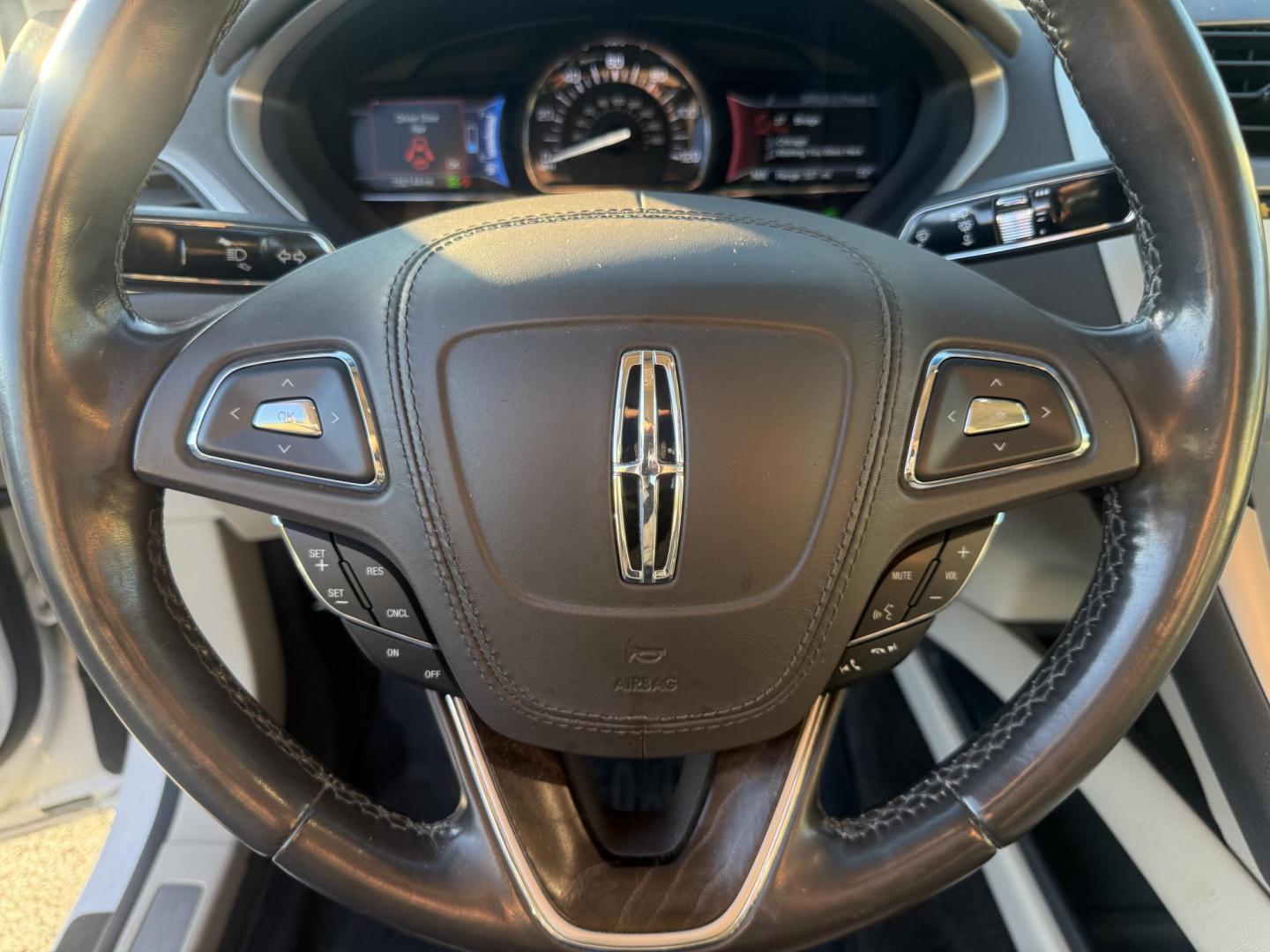 2017 White /White Lincoln MKZ Hybrid Select (3LN6L5LU2HR) with an 2.0L L4 DOHC 16V HYBRID engine, Automatic transmission, located at 547 E. Main St., Orwell, OH, 44076, (440) 437-5893, 41.535435, -80.847855 - Photo#26