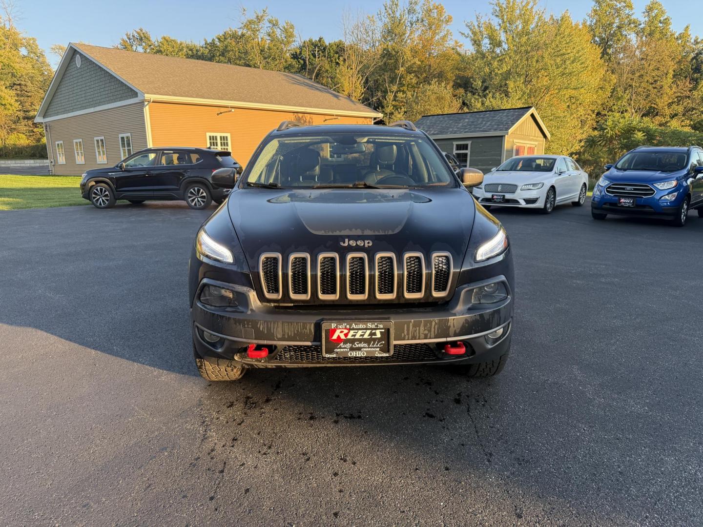 2016 Black /Black Jeep Cherokee Trailhawk 4WD (1C4PJMBS1GW) with an 3.2L V6 DOHC 24V engine, 9A transmission, located at 11115 Chardon Rd. , Chardon, OH, 44024, (440) 214-9705, 41.580246, -81.241943 - This 2016 Jeep Cherokee Trailhawk 4WD is powered by a robust 3.2L V6 engine paired with a 9-speed automatic transmission, delivering strong off-road capability with features like Jeep Active Drive Lock and a locking rear differential. Inside, it offers a leather interior, heated front seats, power d - Photo#1