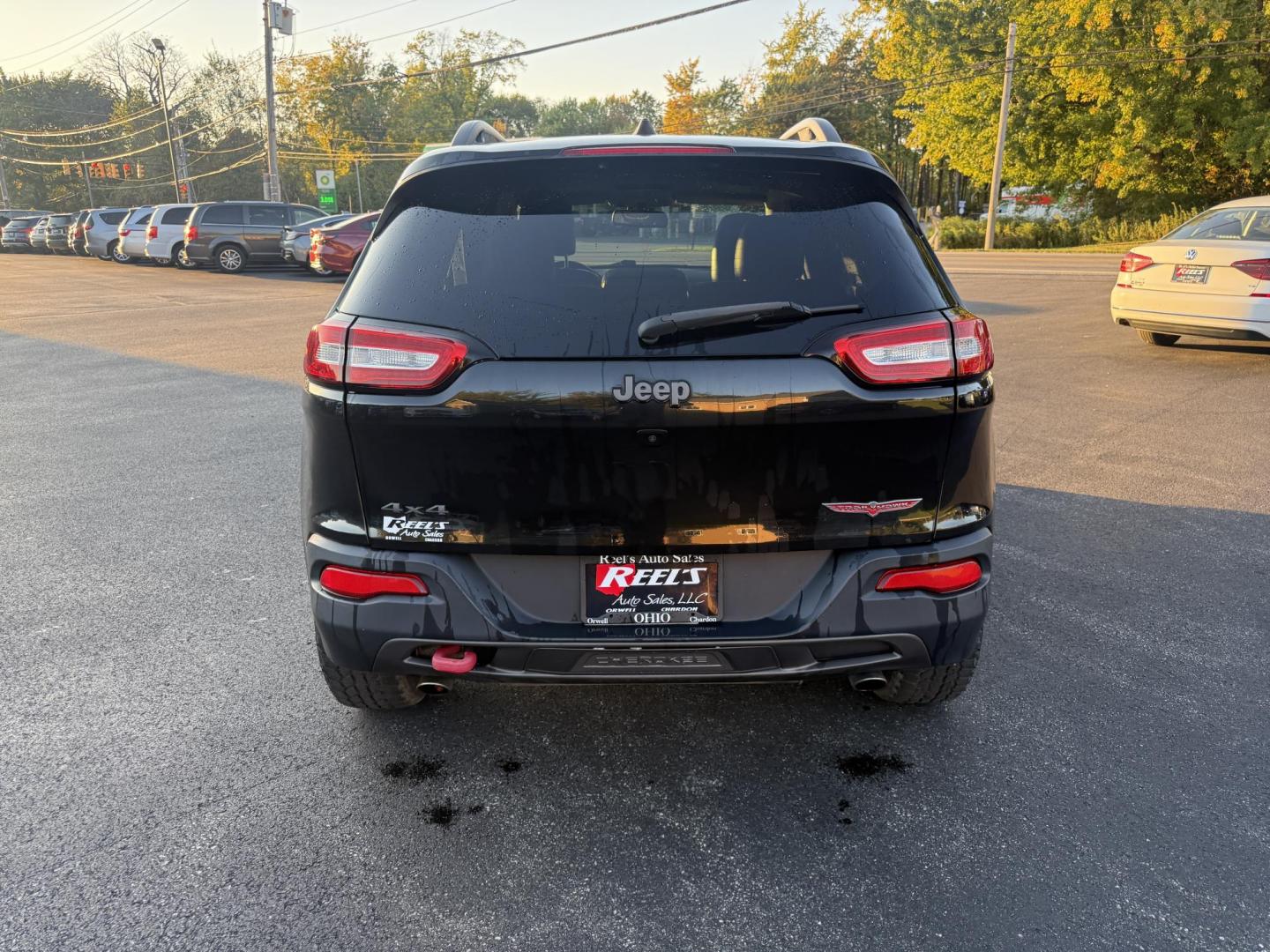 2016 Black /Black Jeep Cherokee Trailhawk 4WD (1C4PJMBS1GW) with an 3.2L V6 DOHC 24V engine, 9A transmission, located at 11115 Chardon Rd. , Chardon, OH, 44024, (440) 214-9705, 41.580246, -81.241943 - This 2016 Jeep Cherokee Trailhawk 4WD is powered by a robust 3.2L V6 engine paired with a 9-speed automatic transmission, delivering strong off-road capability with features like Jeep Active Drive Lock and a locking rear differential. Inside, it offers a leather interior, heated front seats, power d - Photo#9