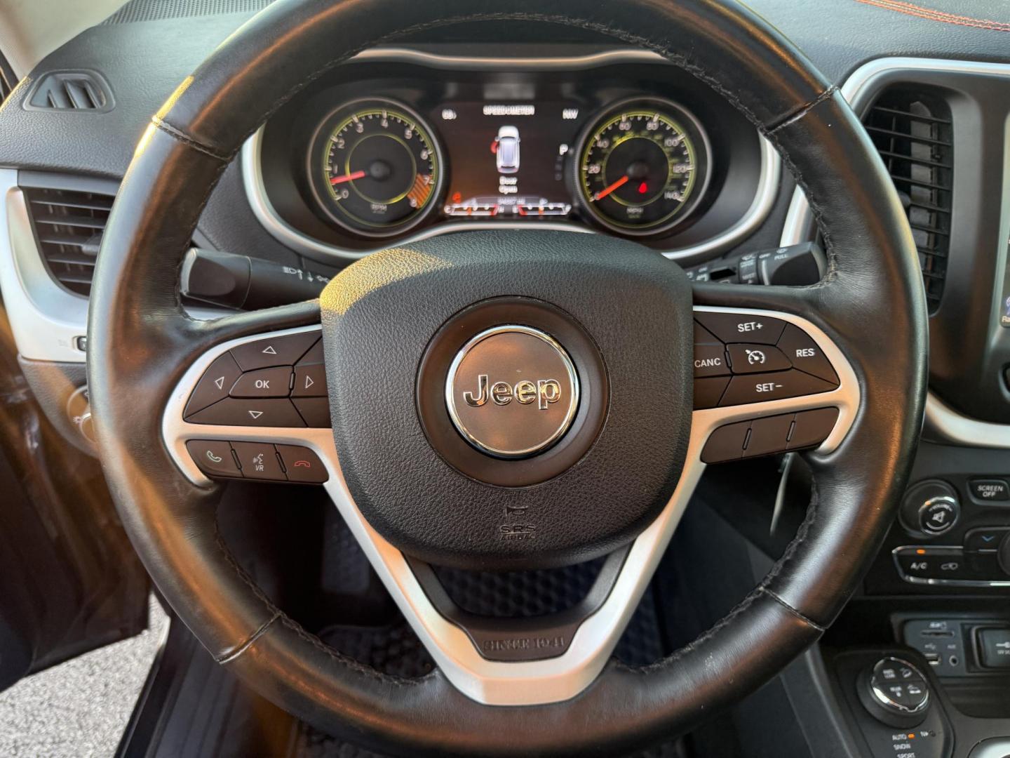 2016 Black /Black Jeep Cherokee Trailhawk 4WD (1C4PJMBS1GW) with an 3.2L V6 DOHC 24V engine, 9A transmission, located at 11115 Chardon Rd. , Chardon, OH, 44024, (440) 214-9705, 41.580246, -81.241943 - This 2016 Jeep Cherokee Trailhawk 4WD is powered by a robust 3.2L V6 engine paired with a 9-speed automatic transmission, delivering strong off-road capability with features like Jeep Active Drive Lock and a locking rear differential. Inside, it offers a leather interior, heated front seats, power d - Photo#24