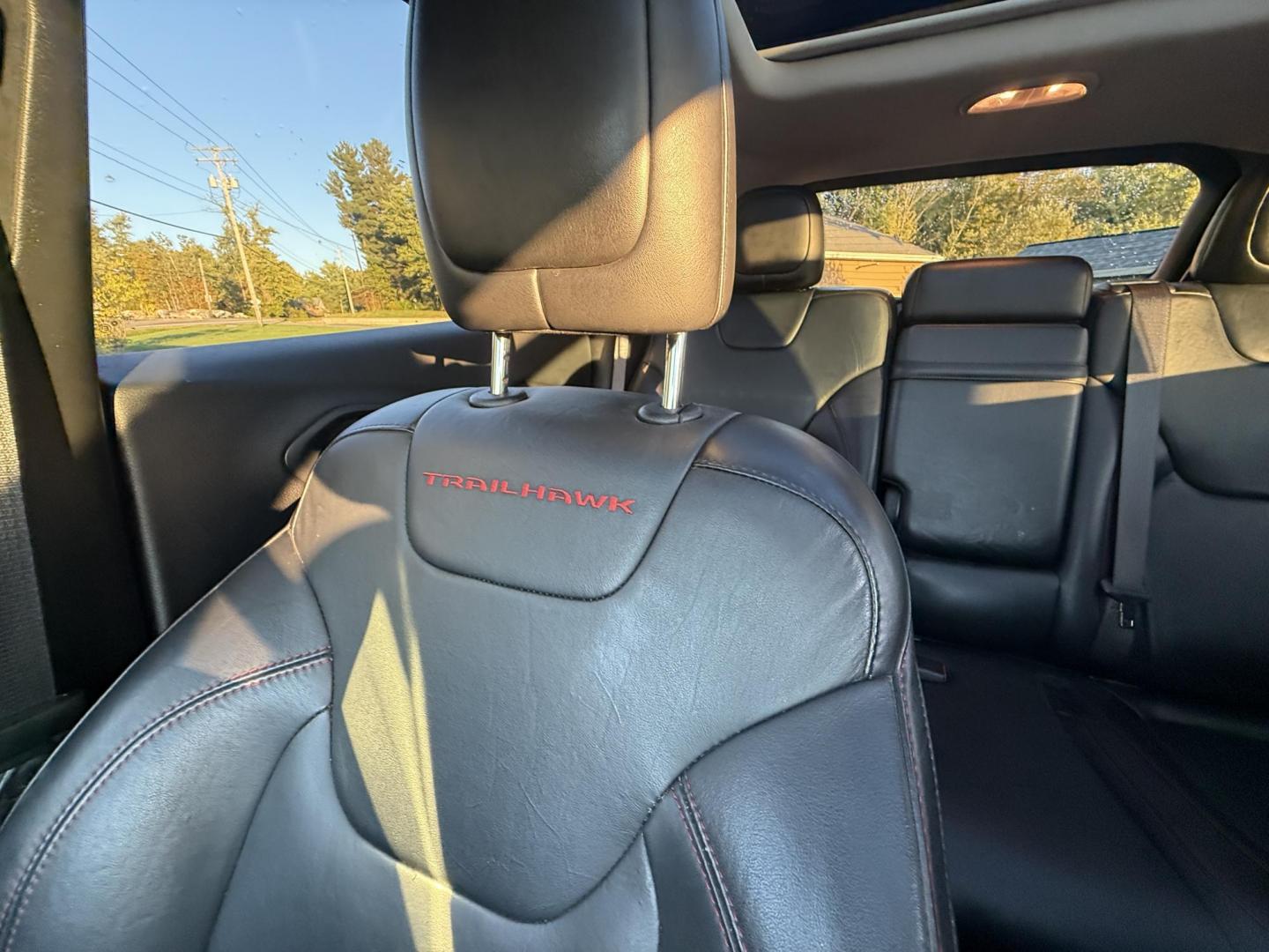 2016 Black /Black Jeep Cherokee Trailhawk 4WD (1C4PJMBS1GW) with an 3.2L V6 DOHC 24V engine, 9A transmission, located at 11115 Chardon Rd. , Chardon, OH, 44024, (440) 214-9705, 41.580246, -81.241943 - This 2016 Jeep Cherokee Trailhawk 4WD is powered by a robust 3.2L V6 engine paired with a 9-speed automatic transmission, delivering strong off-road capability with features like Jeep Active Drive Lock and a locking rear differential. Inside, it offers a leather interior, heated front seats, power d - Photo#35