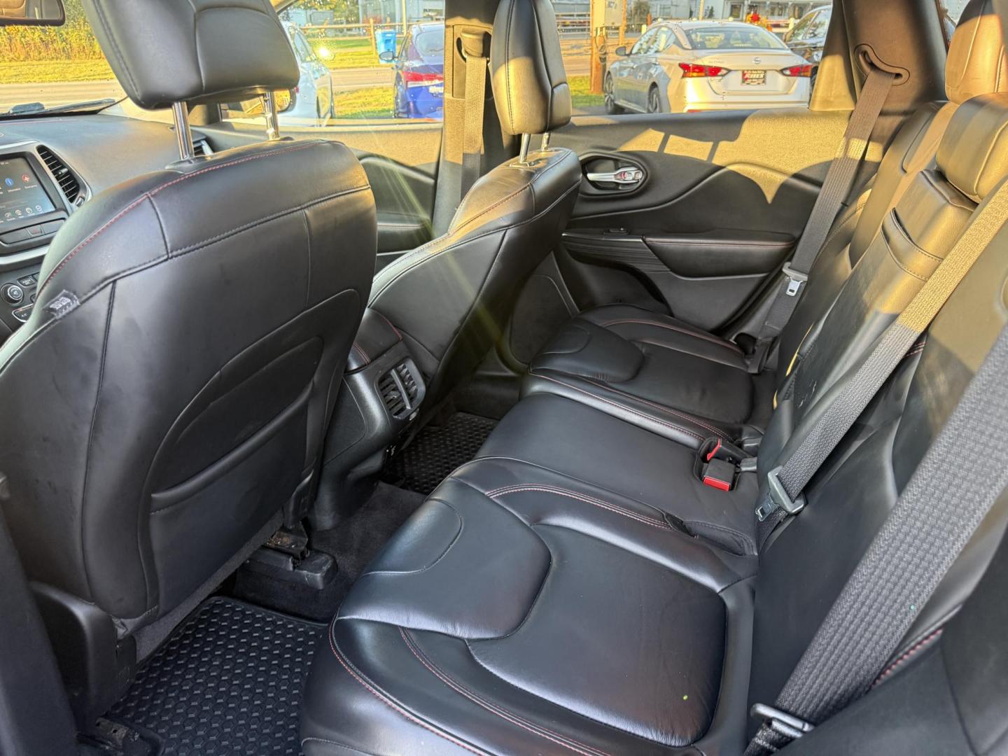 2016 Black /Black Jeep Cherokee Trailhawk 4WD (1C4PJMBS1GW) with an 3.2L V6 DOHC 24V engine, 9A transmission, located at 11115 Chardon Rd. , Chardon, OH, 44024, (440) 214-9705, 41.580246, -81.241943 - This 2016 Jeep Cherokee Trailhawk 4WD is powered by a robust 3.2L V6 engine paired with a 9-speed automatic transmission, delivering strong off-road capability with features like Jeep Active Drive Lock and a locking rear differential. Inside, it offers a leather interior, heated front seats, power d - Photo#37
