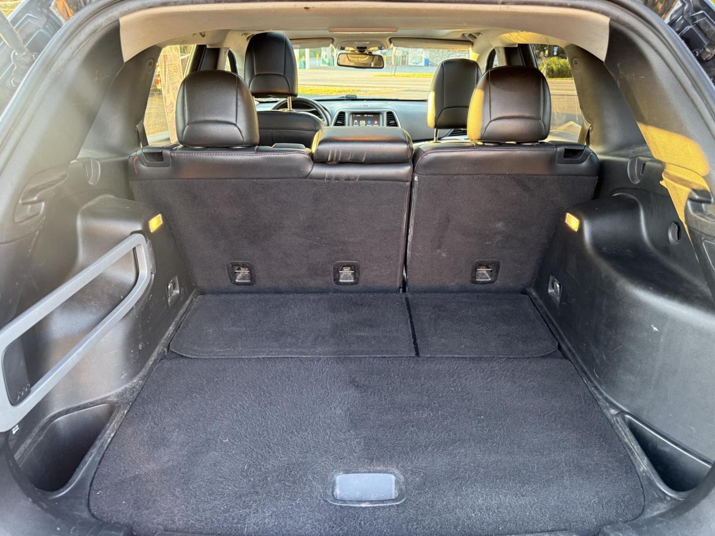 2016 Black /Black Jeep Cherokee Trailhawk 4WD (1C4PJMBS1GW) with an 3.2L V6 DOHC 24V engine, 9A transmission, located at 11115 Chardon Rd. , Chardon, OH, 44024, (440) 214-9705, 41.580246, -81.241943 - This 2016 Jeep Cherokee Trailhawk 4WD is powered by a robust 3.2L V6 engine paired with a 9-speed automatic transmission, delivering strong off-road capability with features like Jeep Active Drive Lock and a locking rear differential. Inside, it offers a leather interior, heated front seats, power d - Photo#41