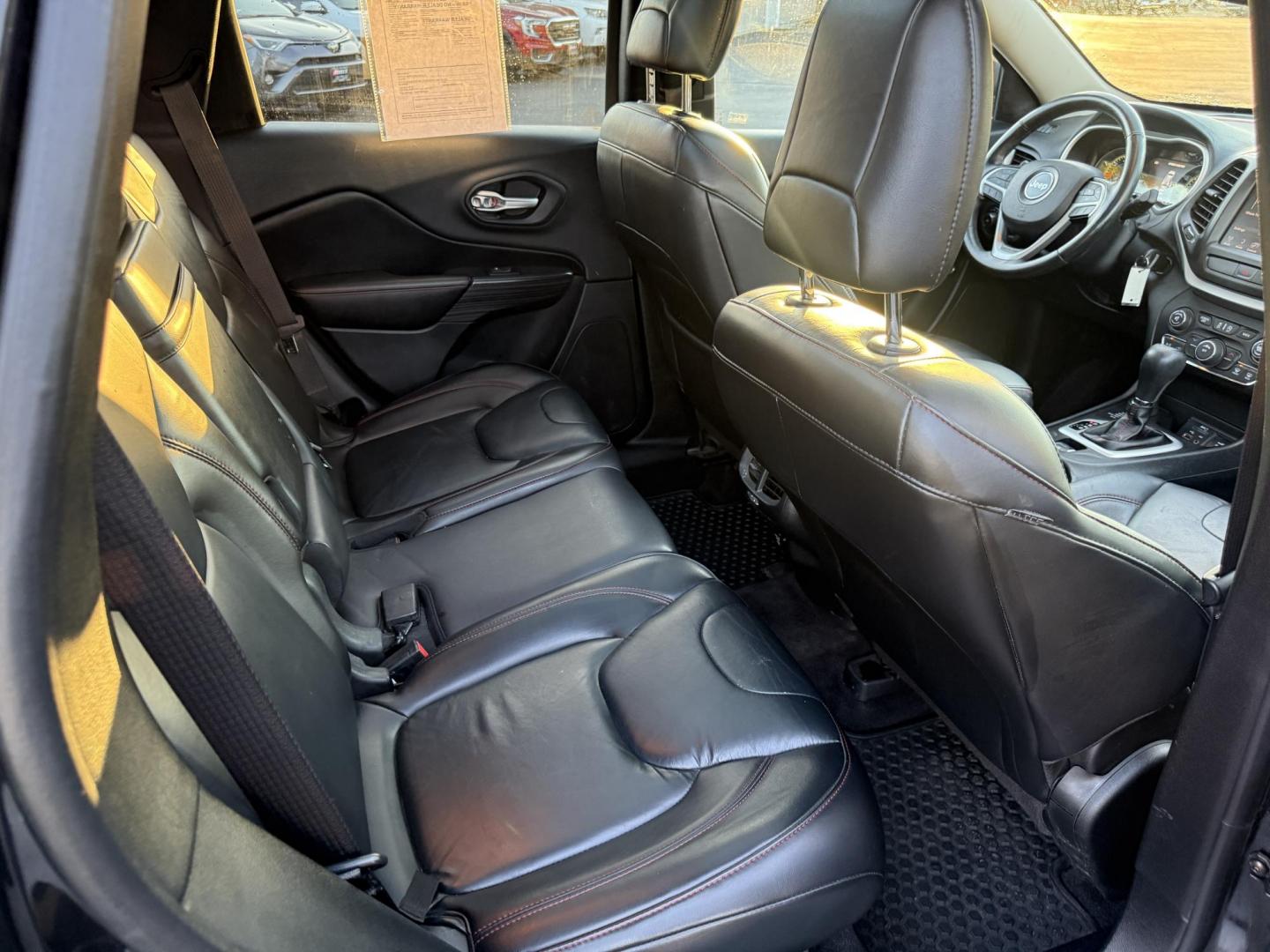 2016 Black /Black Jeep Cherokee Trailhawk 4WD (1C4PJMBS1GW) with an 3.2L V6 DOHC 24V engine, 9A transmission, located at 11115 Chardon Rd. , Chardon, OH, 44024, (440) 214-9705, 41.580246, -81.241943 - This 2016 Jeep Cherokee Trailhawk 4WD is powered by a robust 3.2L V6 engine paired with a 9-speed automatic transmission, delivering strong off-road capability with features like Jeep Active Drive Lock and a locking rear differential. Inside, it offers a leather interior, heated front seats, power d - Photo#43