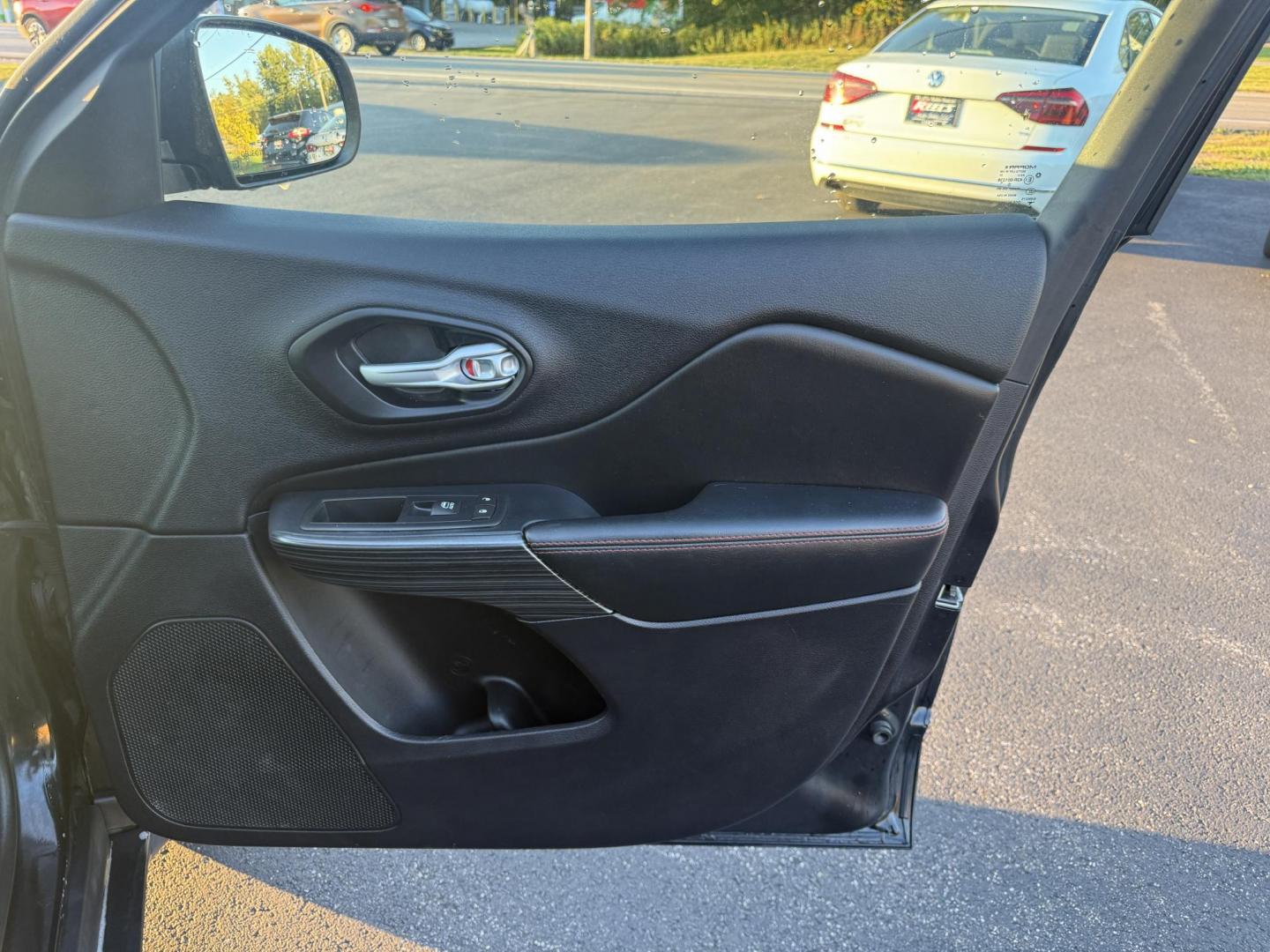 2016 Black /Black Jeep Cherokee Trailhawk 4WD (1C4PJMBS1GW) with an 3.2L V6 DOHC 24V engine, 9A transmission, located at 11115 Chardon Rd. , Chardon, OH, 44024, (440) 214-9705, 41.580246, -81.241943 - This 2016 Jeep Cherokee Trailhawk 4WD is powered by a robust 3.2L V6 engine paired with a 9-speed automatic transmission, delivering strong off-road capability with features like Jeep Active Drive Lock and a locking rear differential. Inside, it offers a leather interior, heated front seats, power d - Photo#48