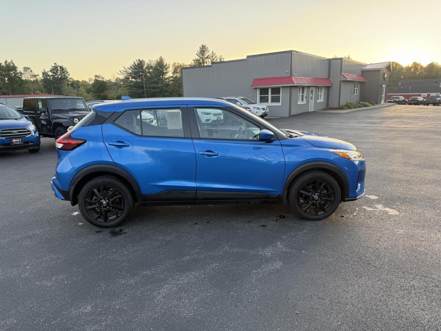 2021 Blue /Black Nissan Kicks SV (3N1CP5CV8ML) with an 1.6L I4 engine, Automatic transmission, located at 11115 Chardon Rd. , Chardon, OH, 44024, (440) 214-9705, 41.580246, -81.241943 - This One Owner 2021 Nissan Kicks SV is powered by a fuel-efficient 1.6L I4 engine delivering up to 36 MPG on the highway, and comes well-equipped with an 8.0" touchscreen featuring Apple CarPlay and Android Auto, adaptive cruise control, lane departure warning, and blind spot monitoring. Additional - Photo#5